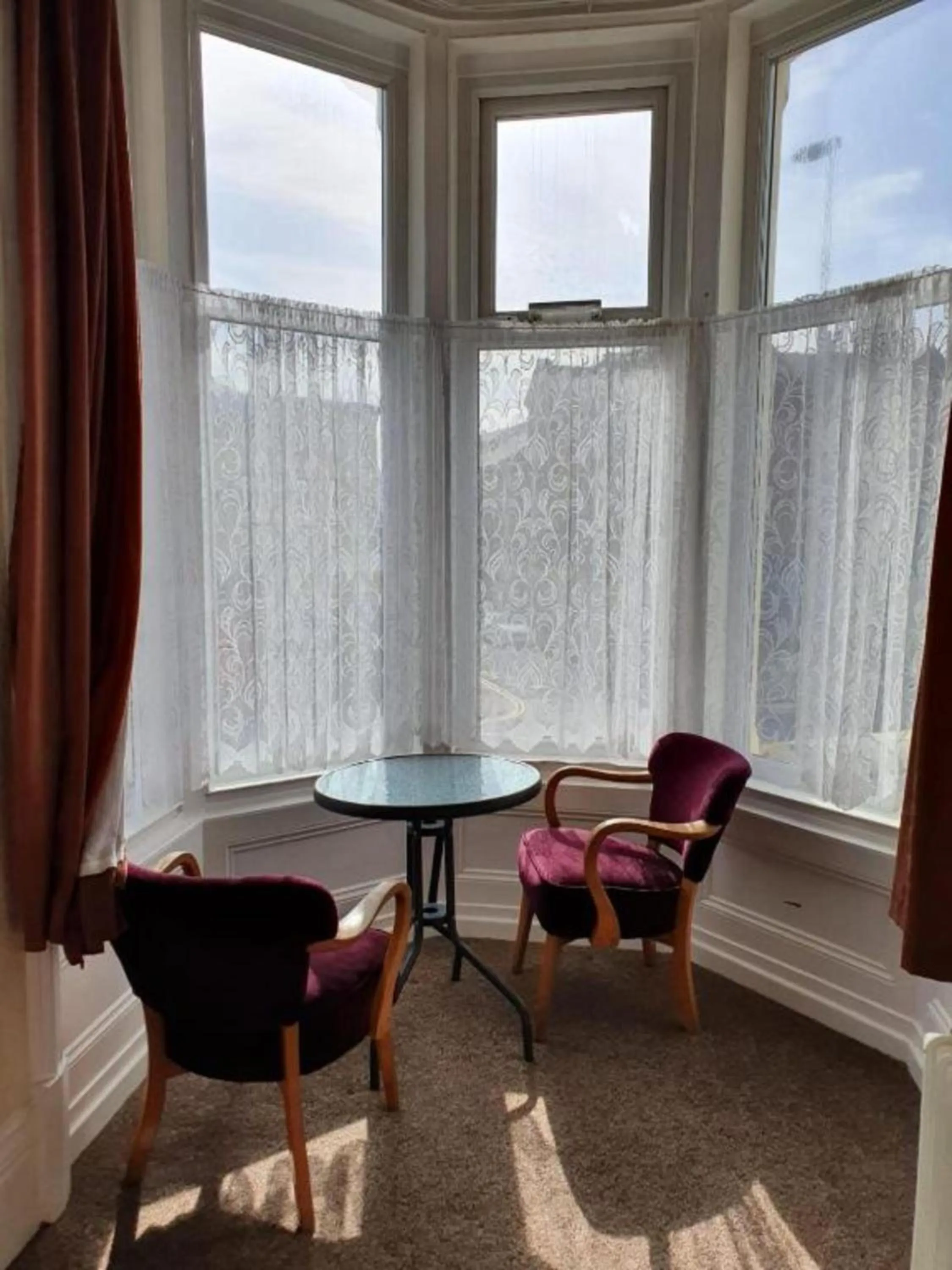 Seating area in Dora Hotel