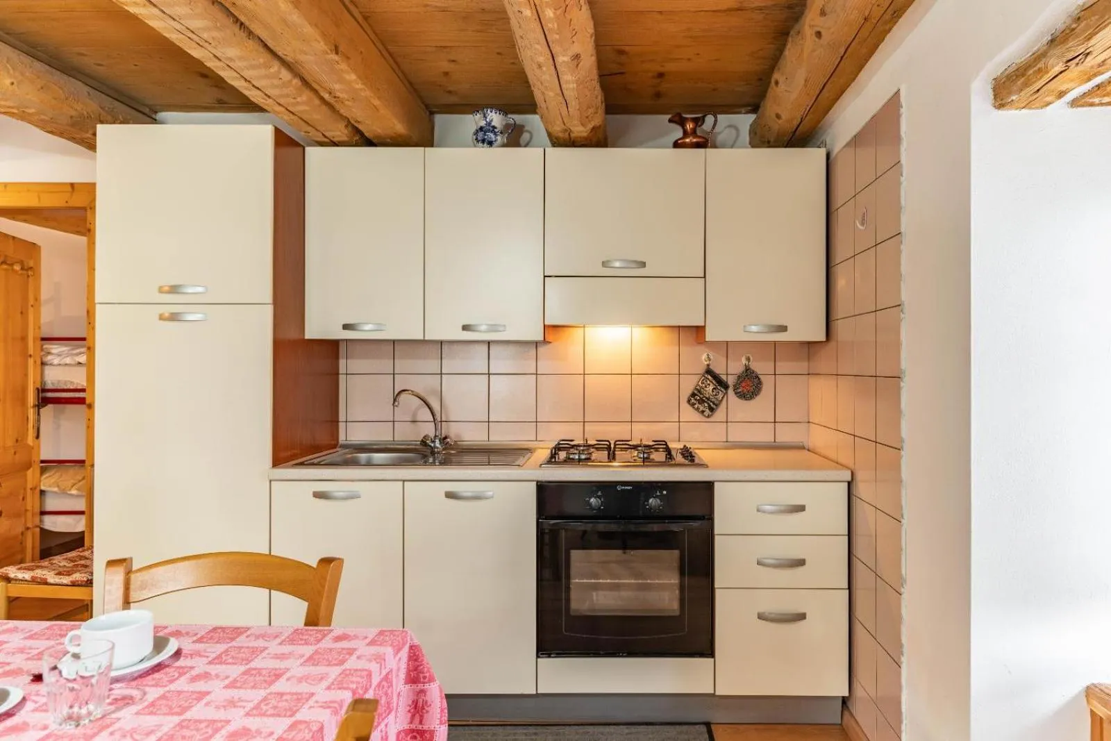 Kitchen or kitchenette in Chalet Musiera