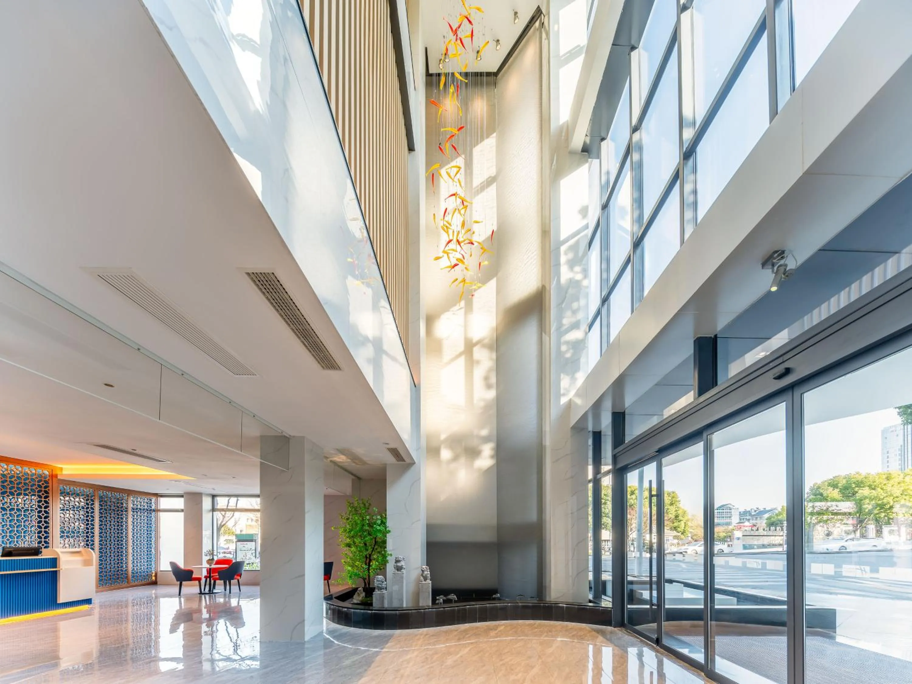 Communal lounge/ TV room in Holiday Inn Express Suzhou City Center by IHG