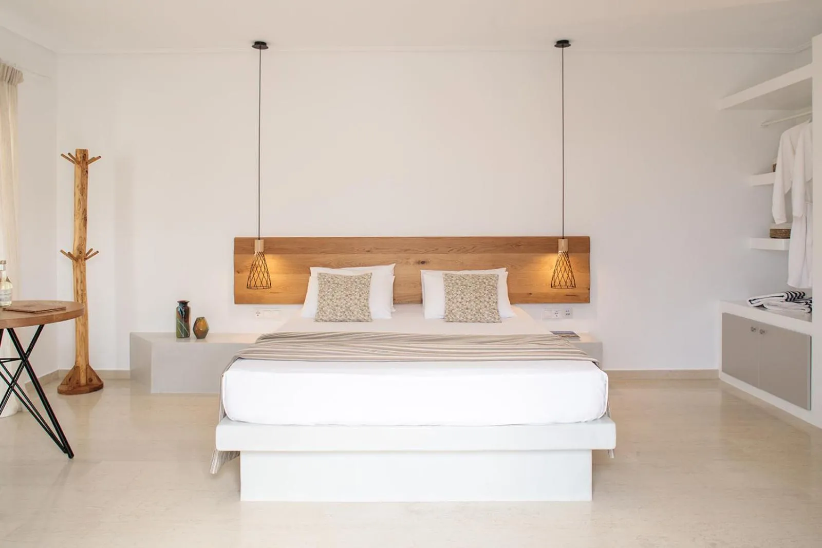 Bed in Proteas Hotel & Suites