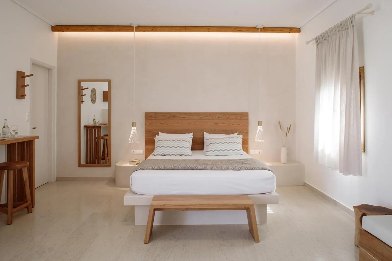 Bed in Proteas Hotel & Suites