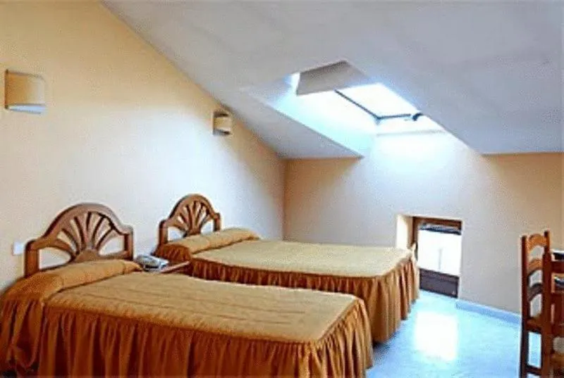 Bed in Hotel Laberinto