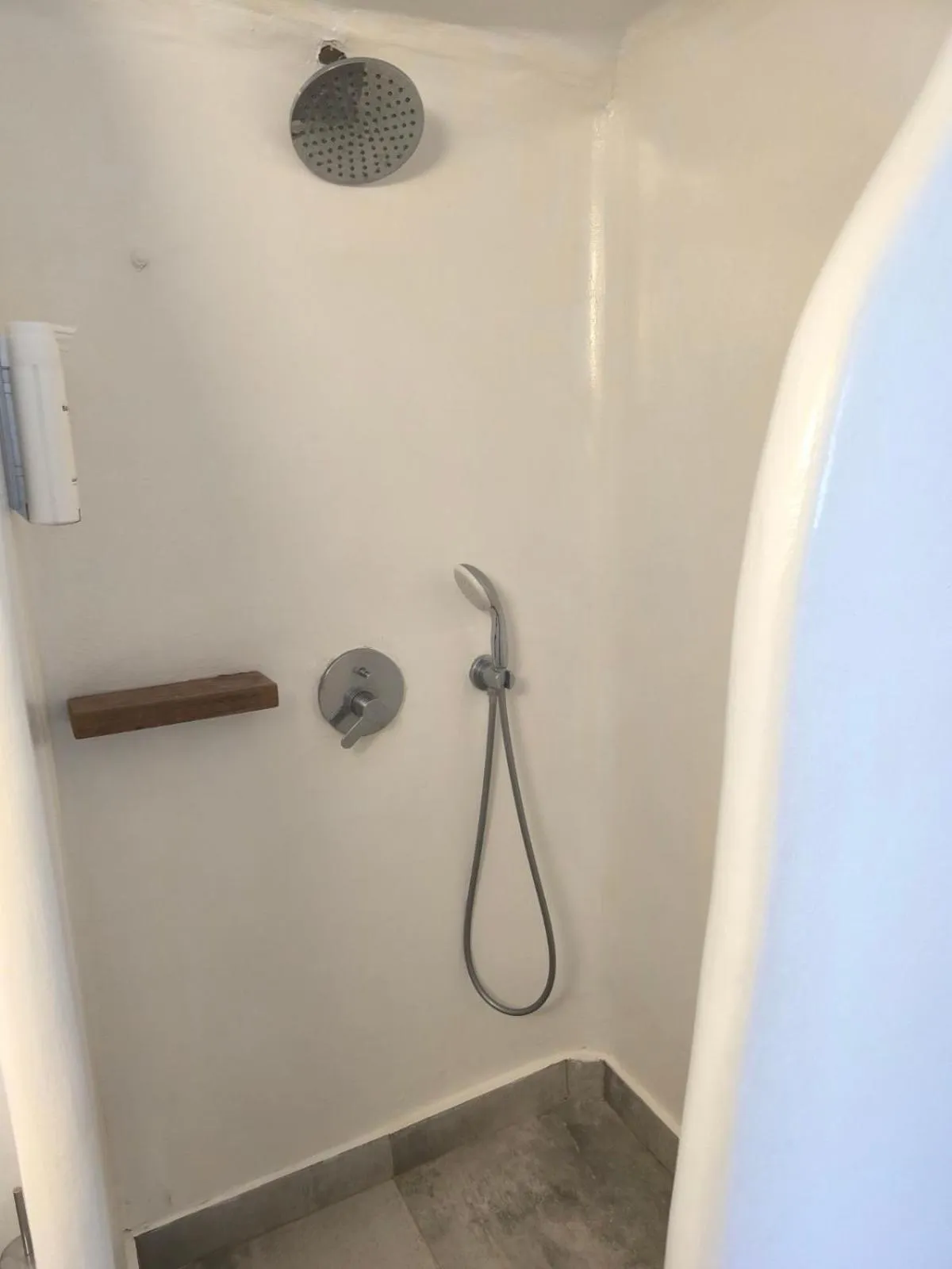 Shower in Amaze Suites