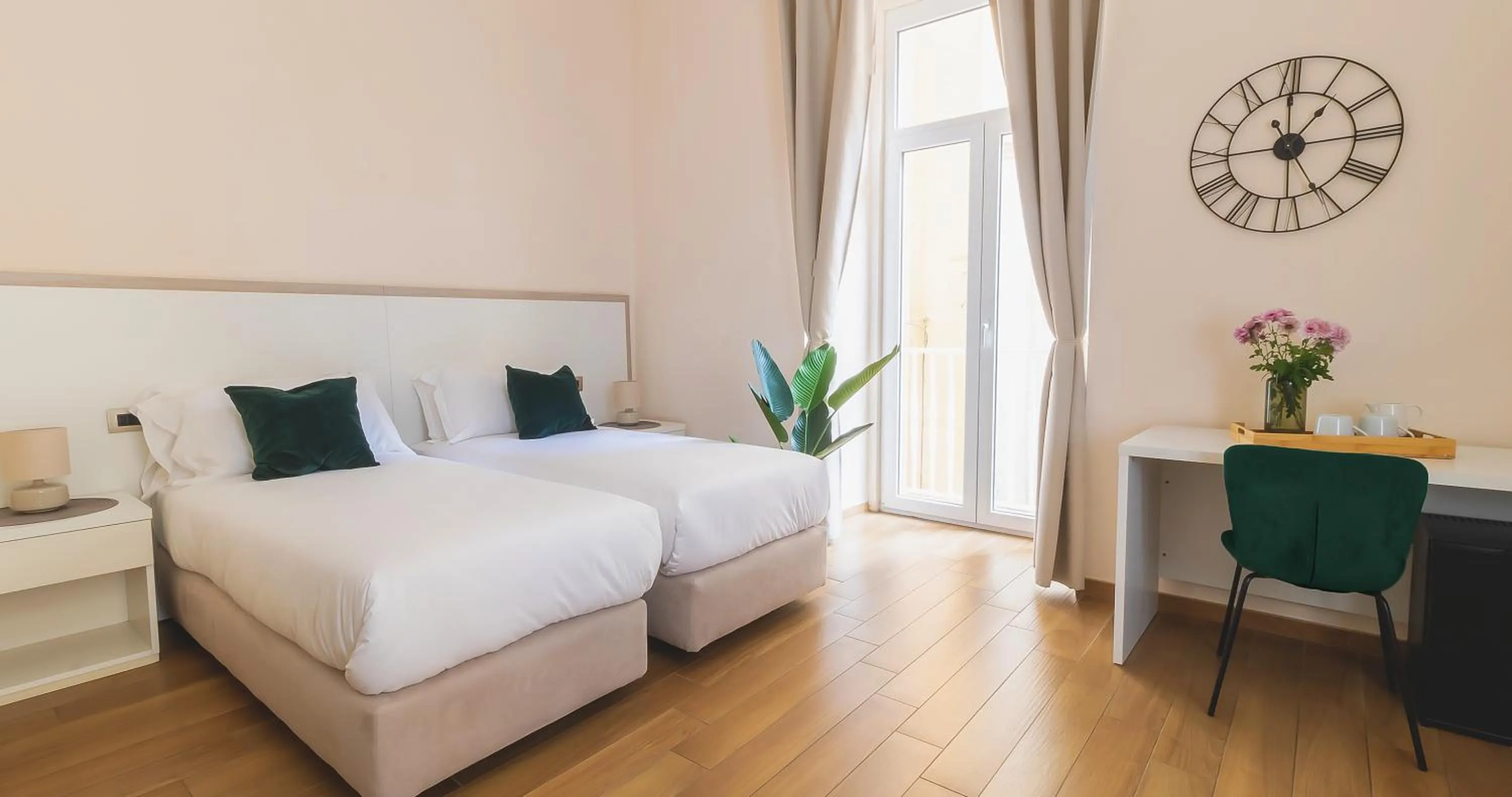 Bed in Musto Suites & Rooms