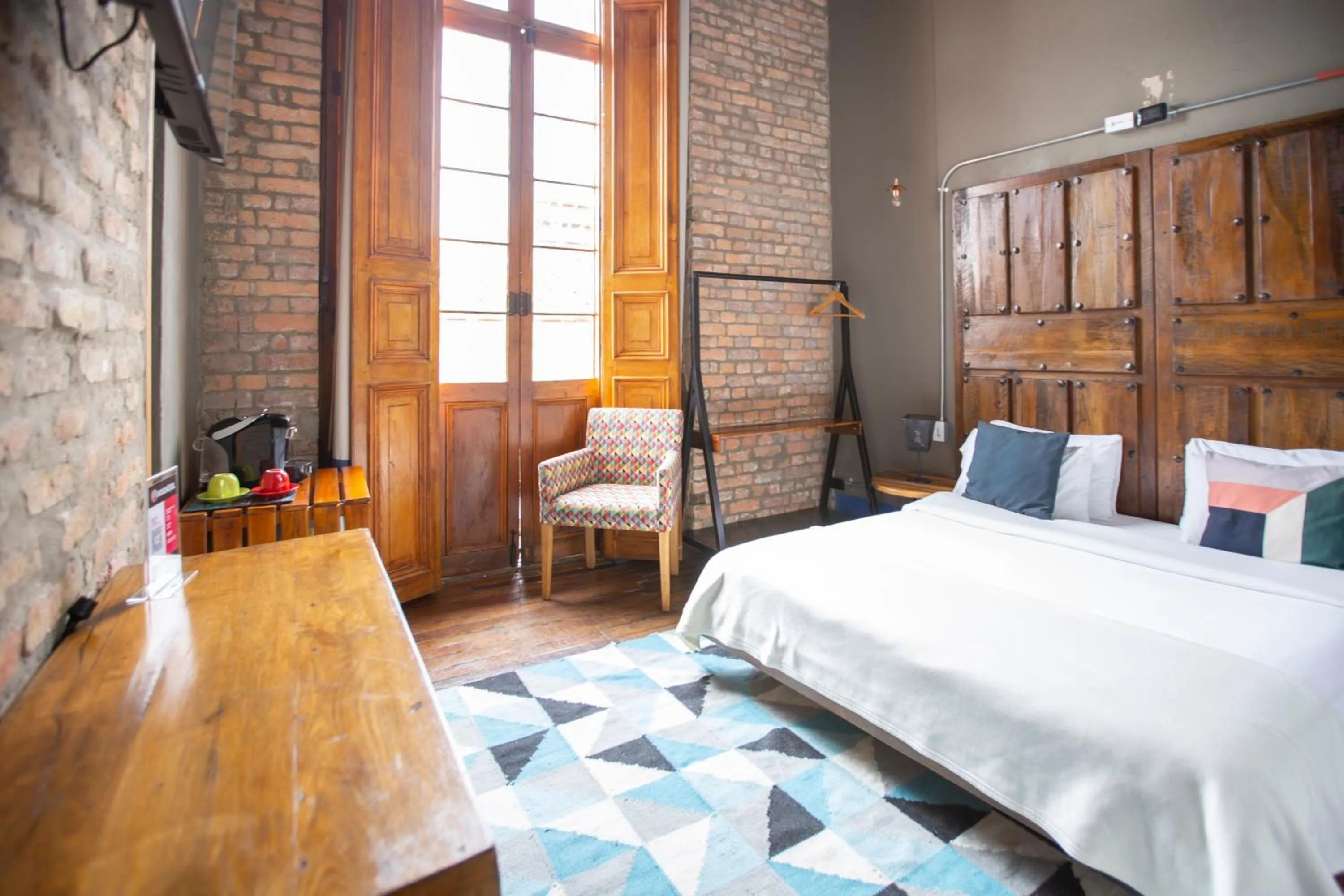 Bed in Delgadillo Hotel by Socialtel