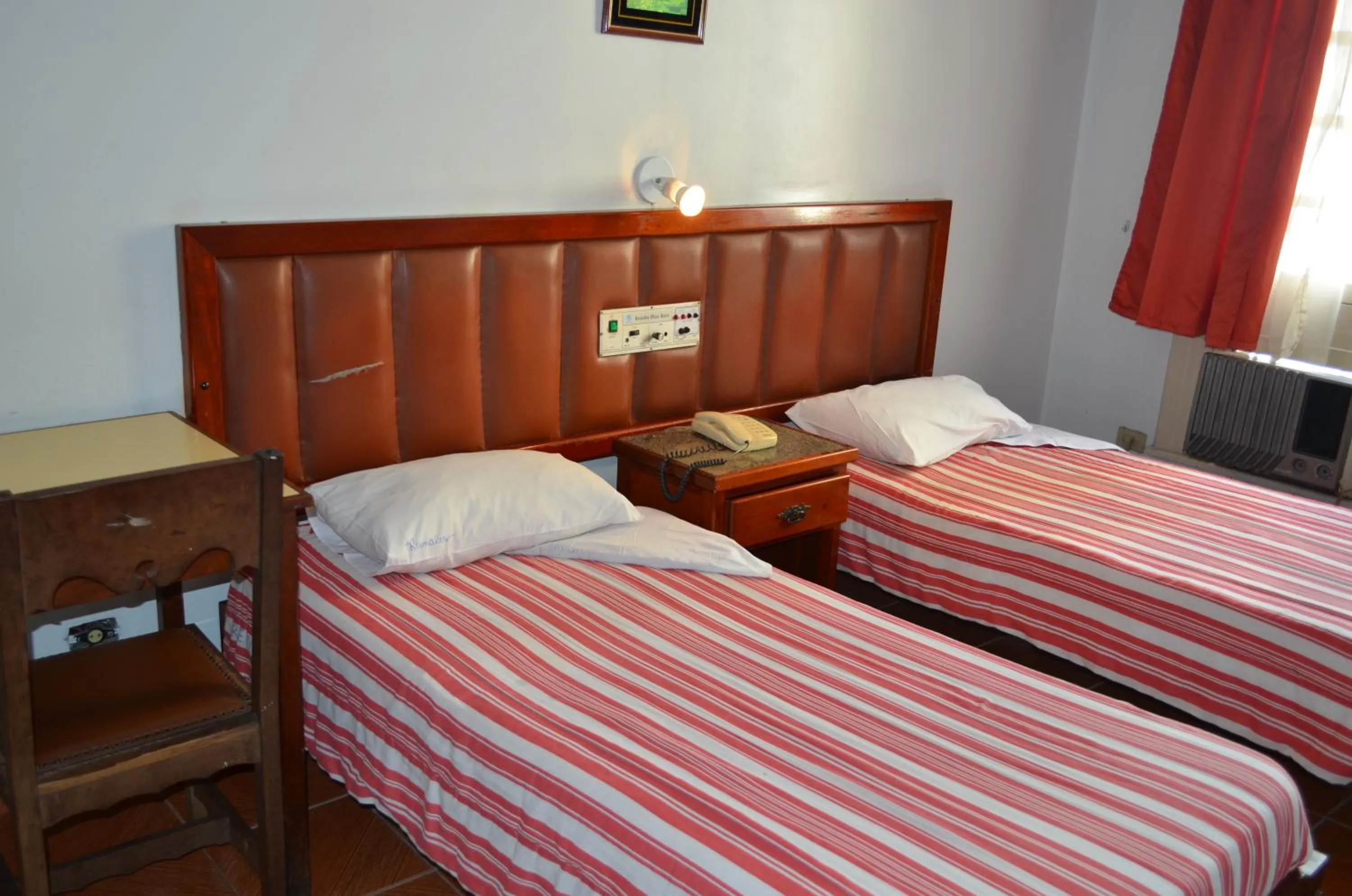 Day, Bed in Reinales Plaza Hotel