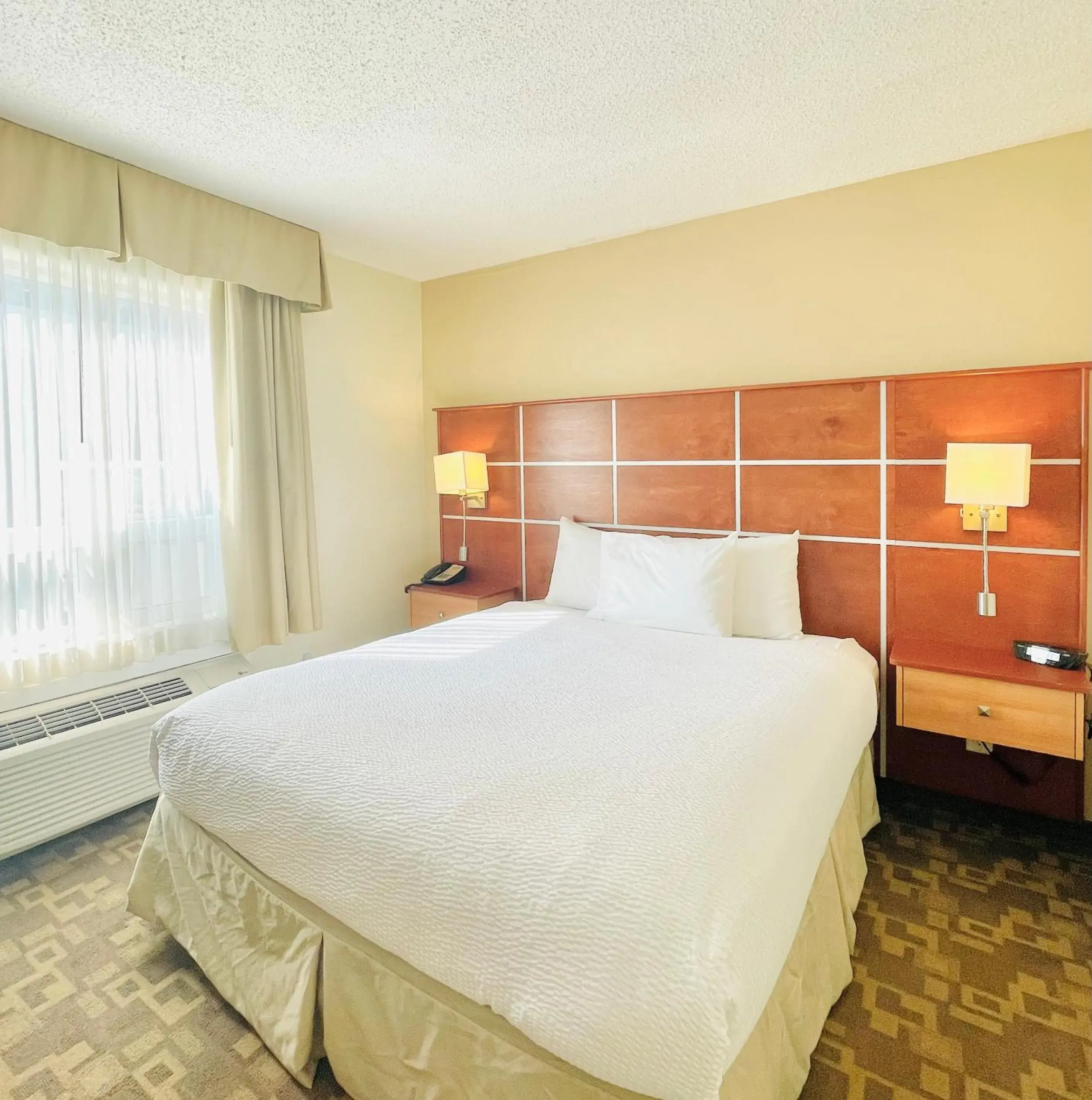 Bed in Days Inn by Wyndham Grande Prairie Bed in Days Inn by Wyndham Grande Prairie