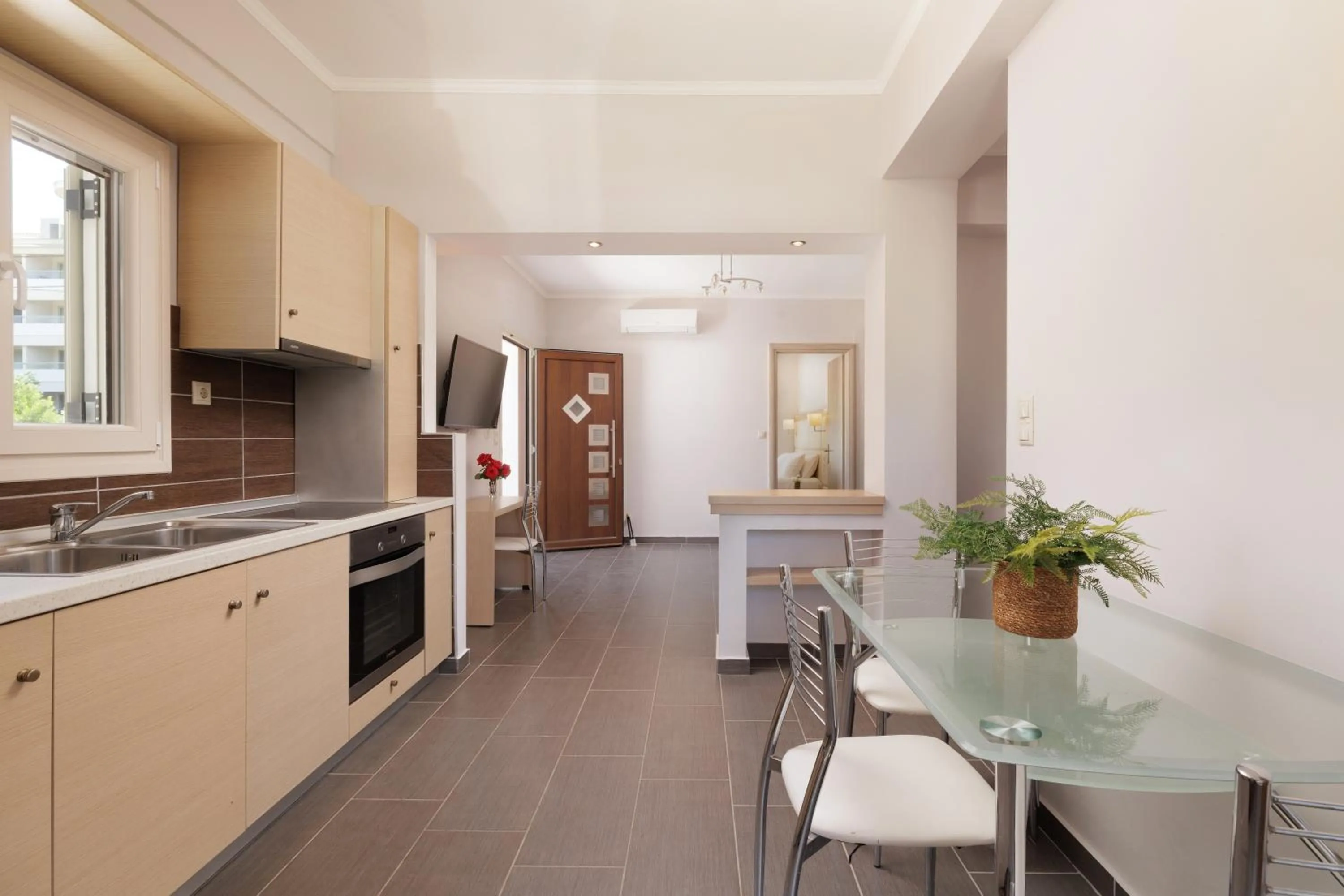 Kitchen or kitchenette in Santos Luxury Apartments
