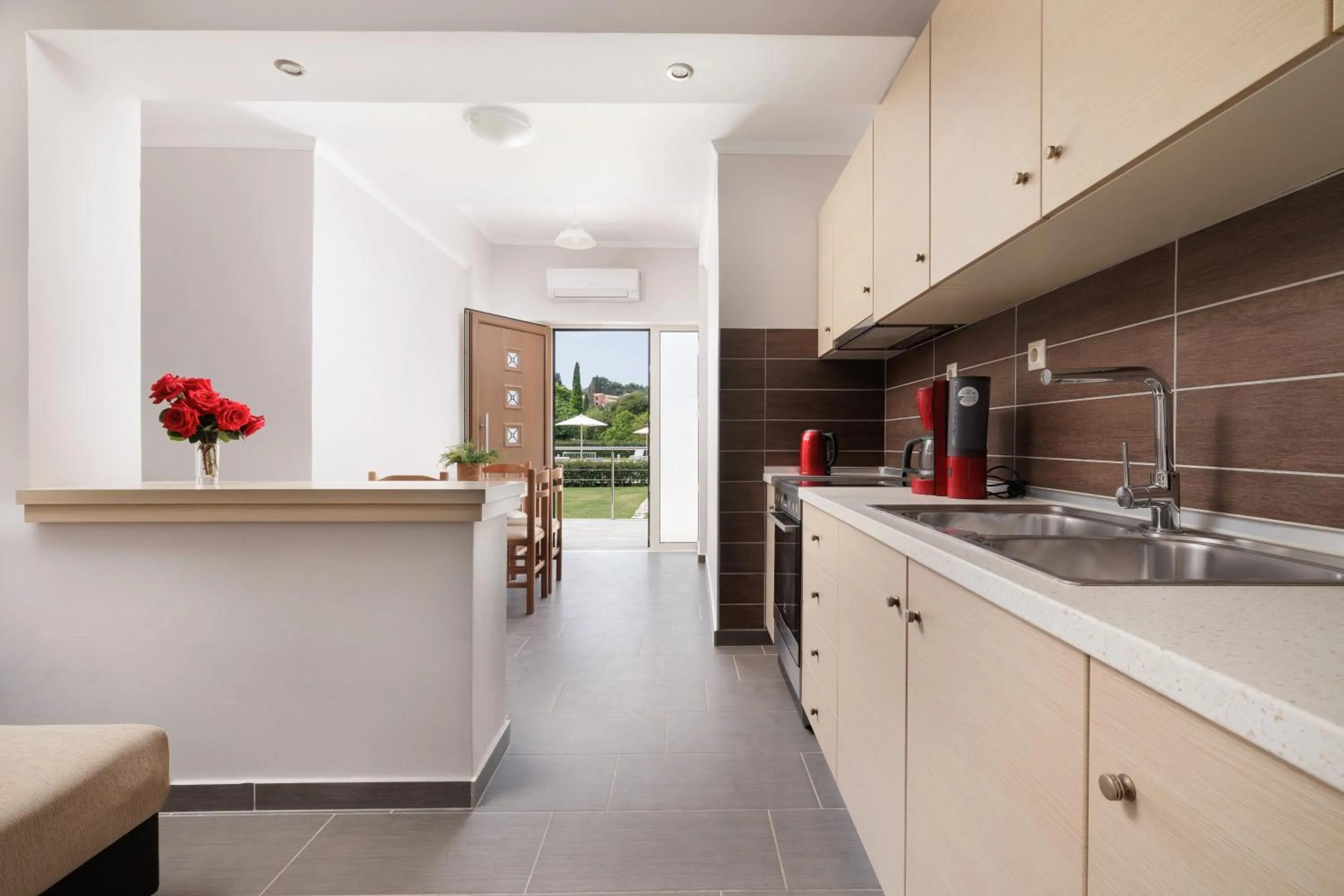 Kitchen or kitchenette in Santos Luxury Apartments