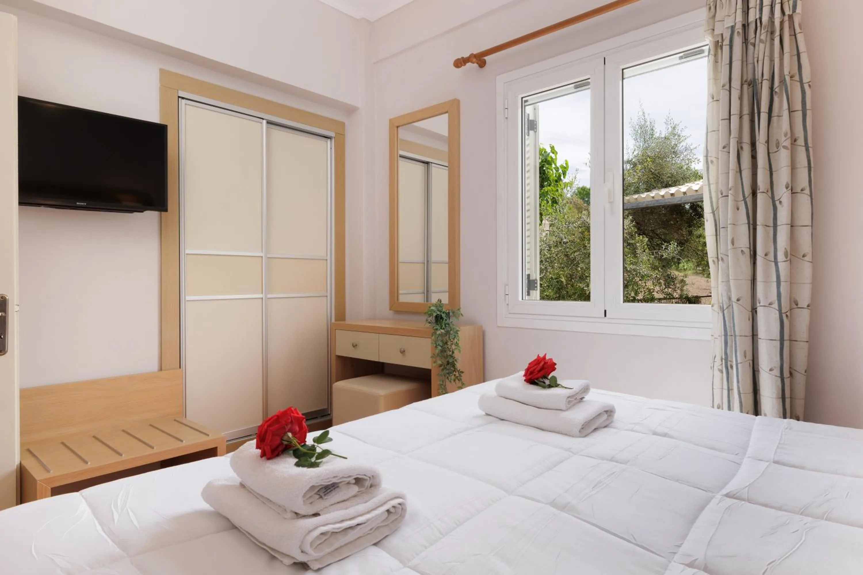 Bed in Santos Luxury Apartments