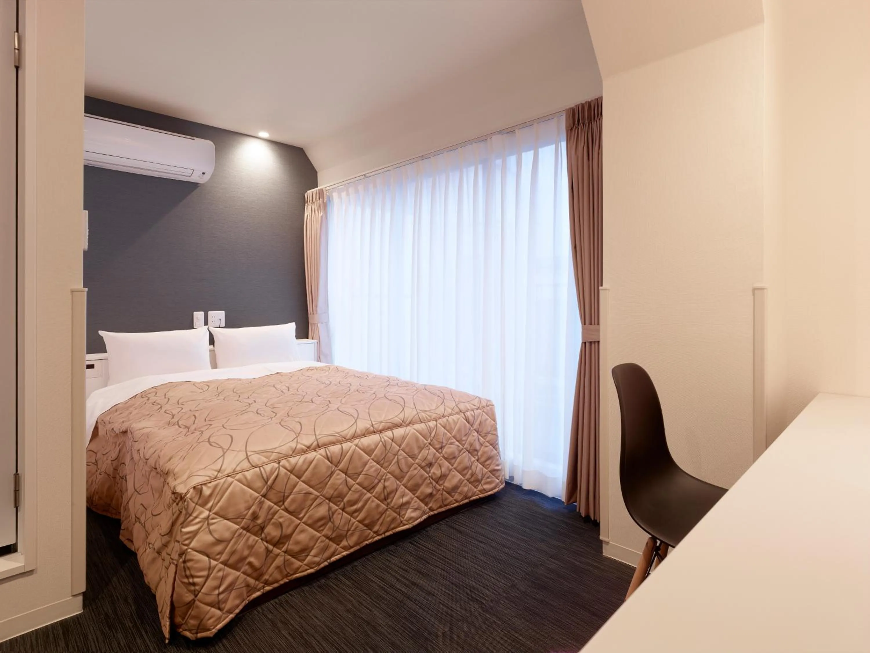 Bed in Hotel New Tohoku