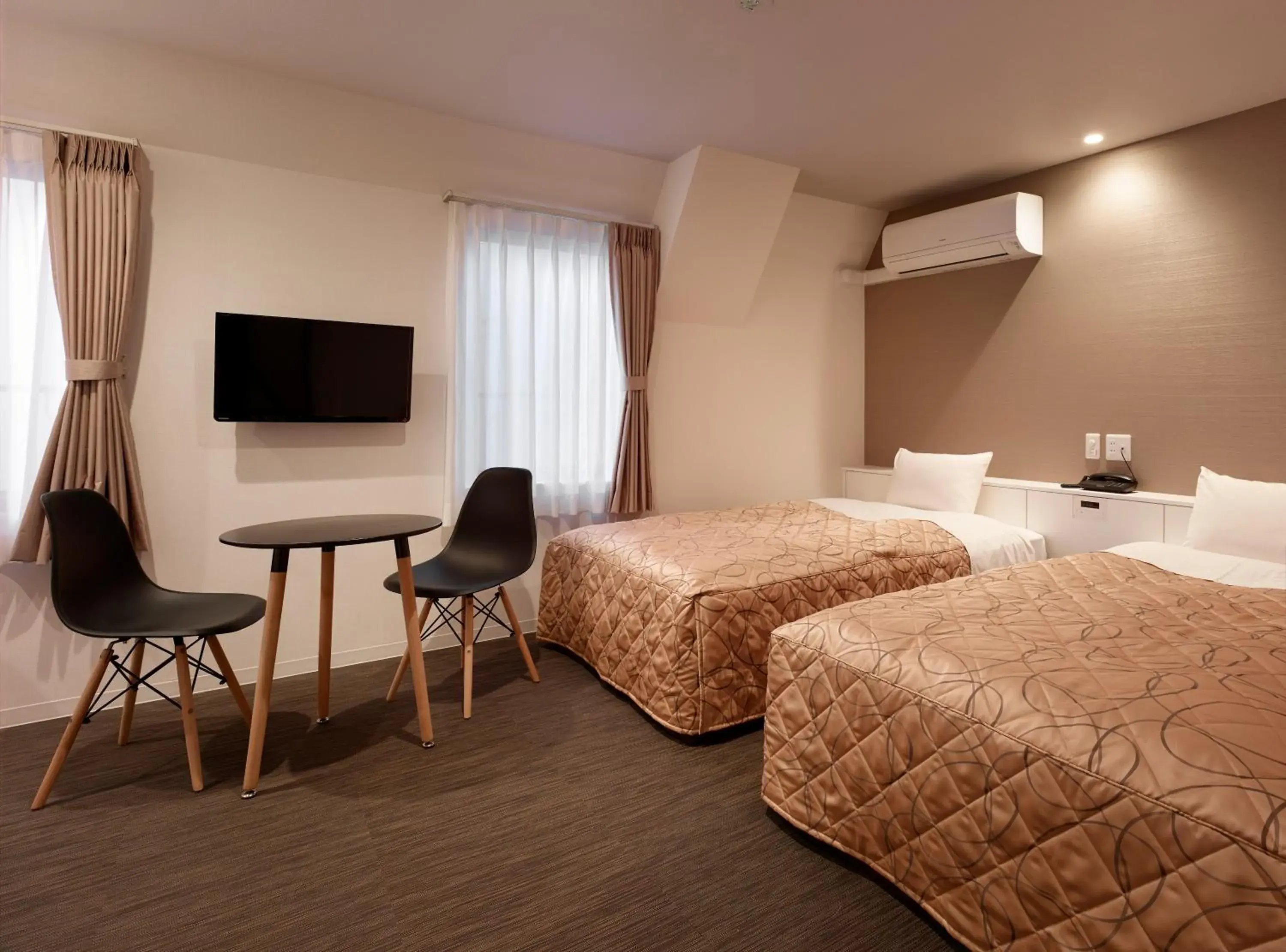 Bed in Hotel New Tohoku Bed in Hotel New Tohoku