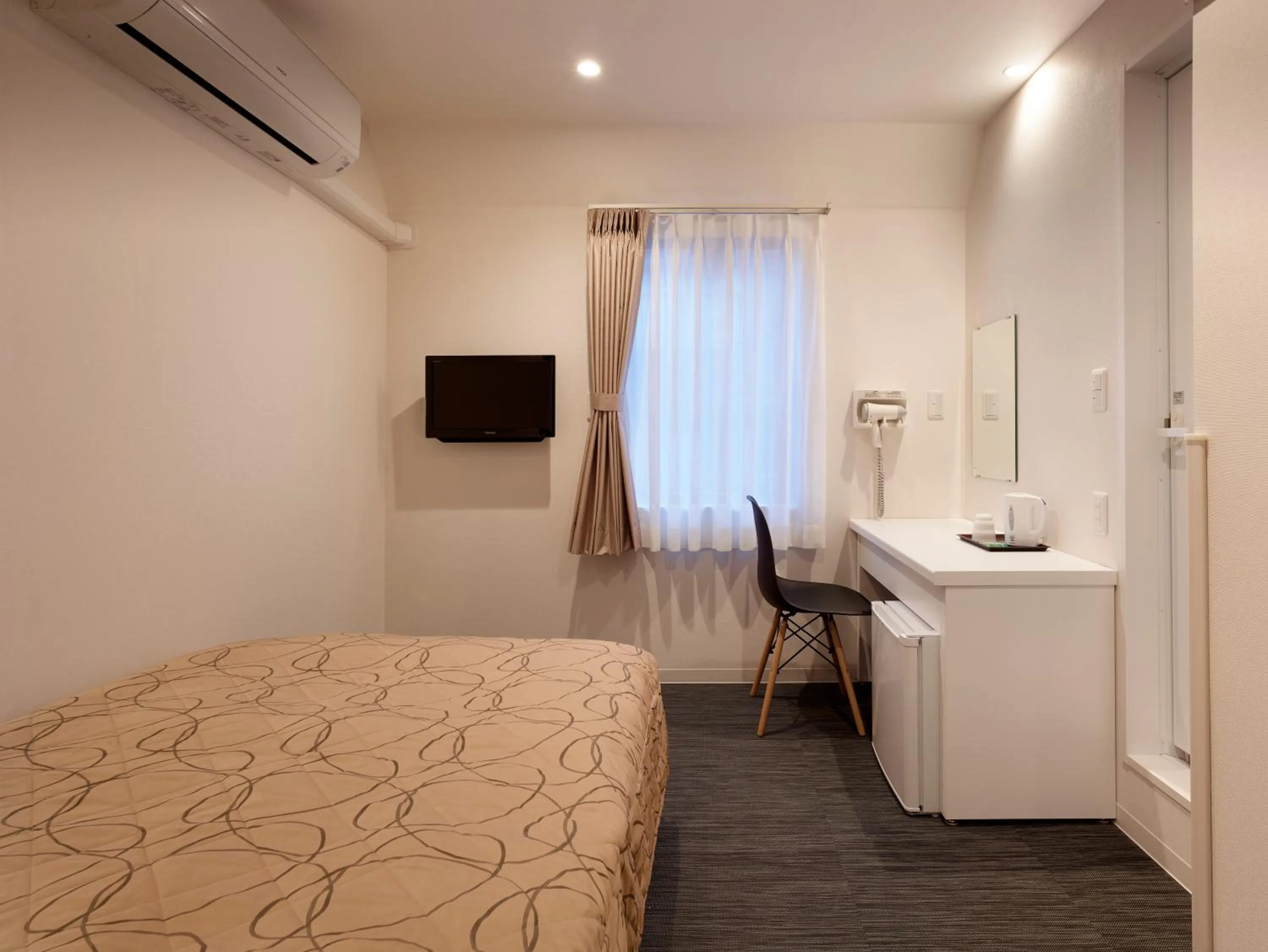 Bed in Hotel New Tohoku