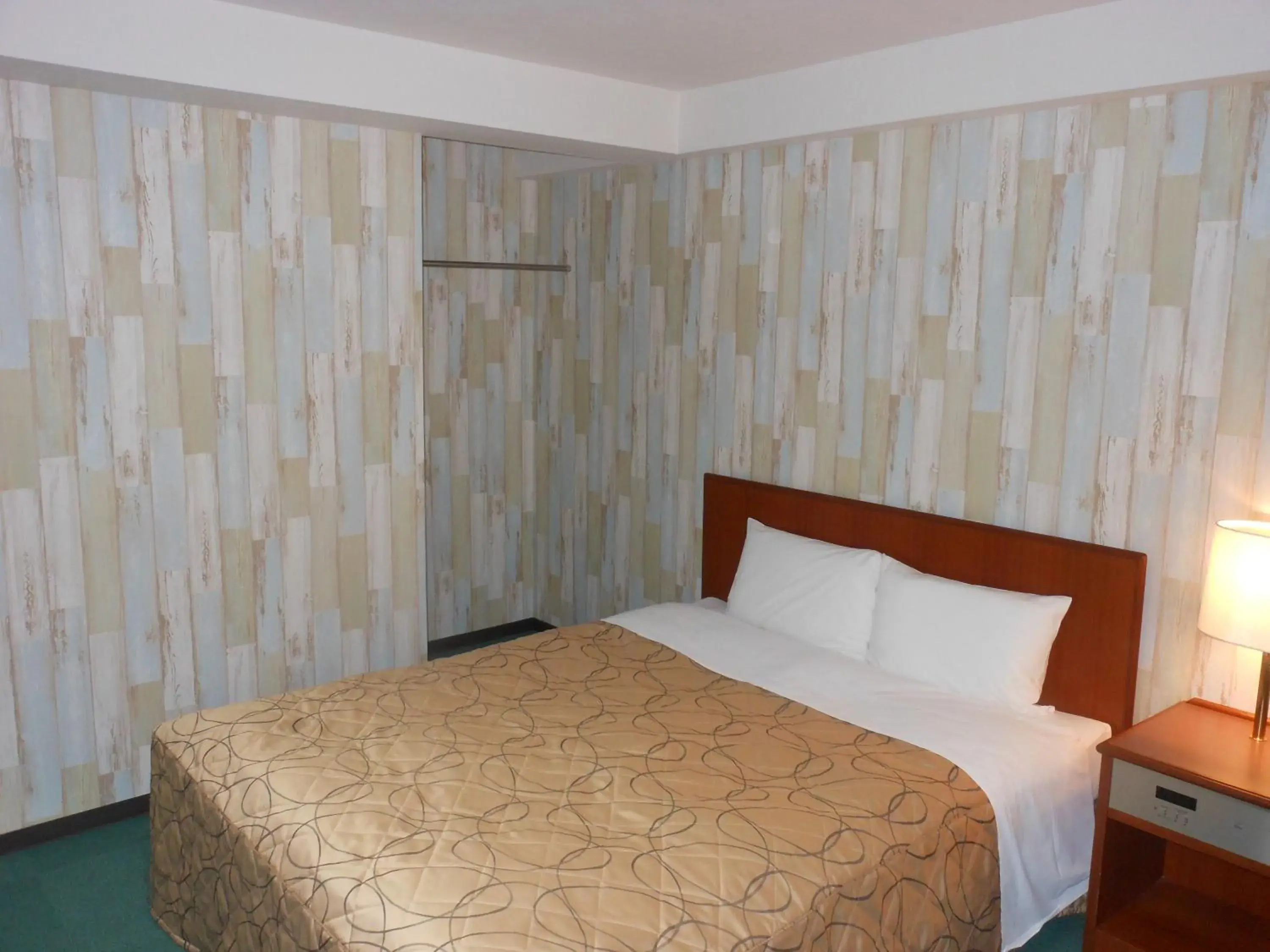 Bed in Hotel New Tohoku Bed in Hotel New Tohoku