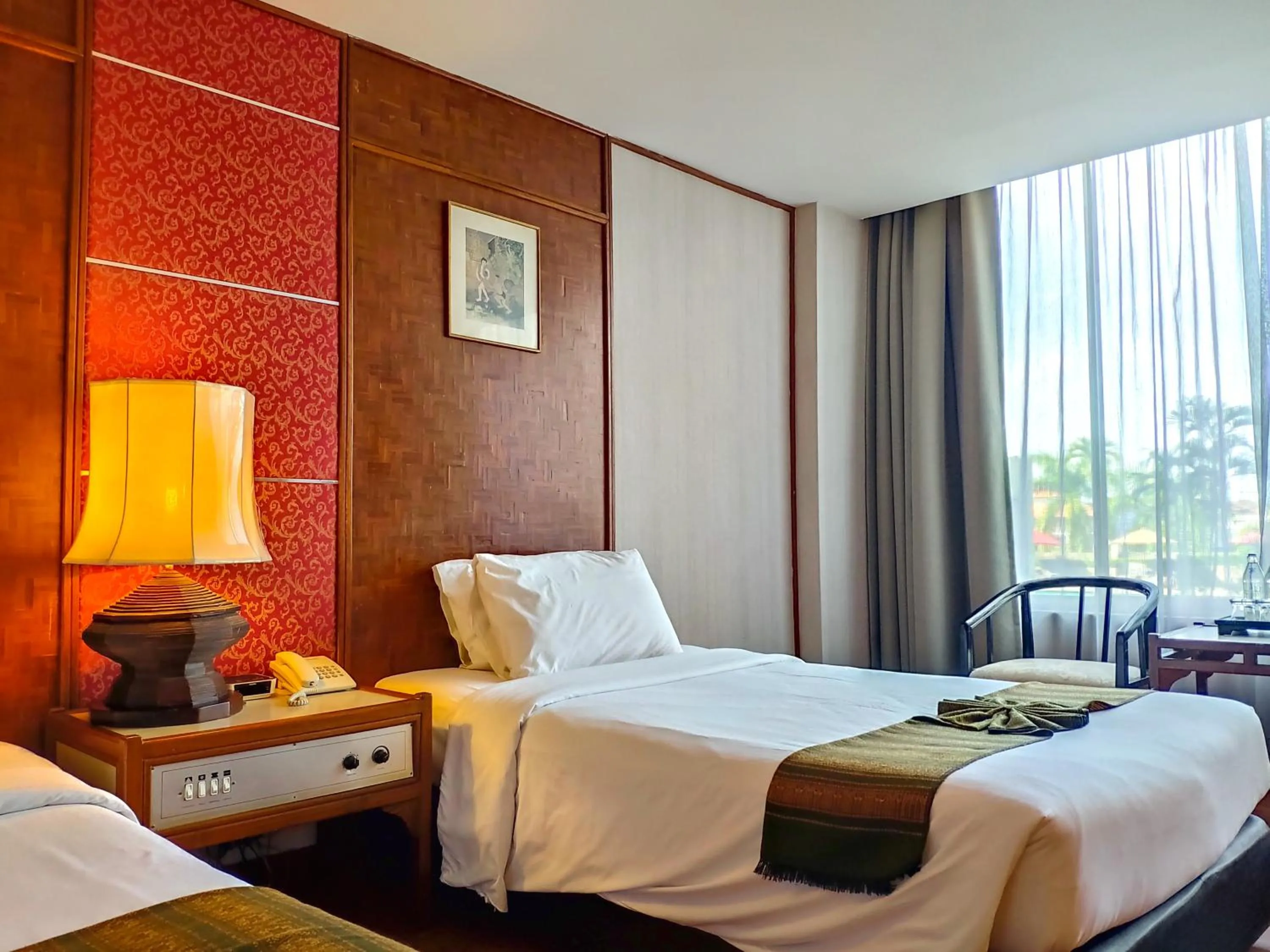 Bed in Chiang Mai Orchid Hotel