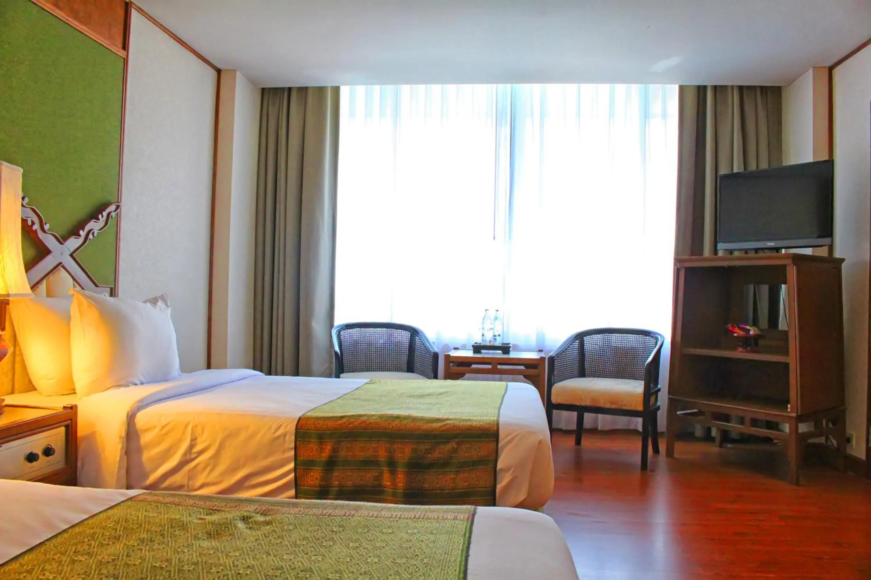 Photo of the whole room, Bed in Chiang Mai Orchid Hotel