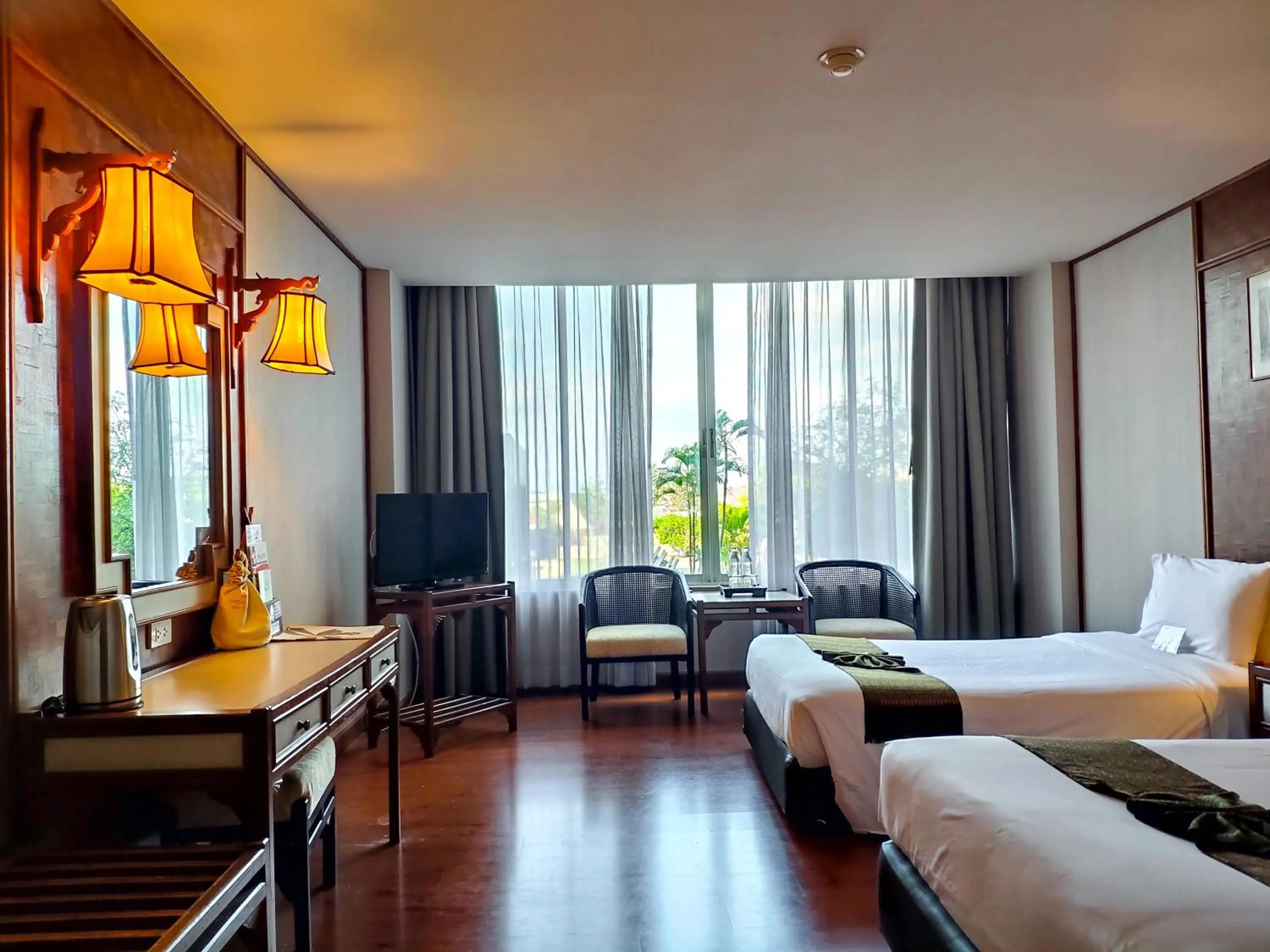 Photo of the whole room, Bed in Chiang Mai Orchid Hotel