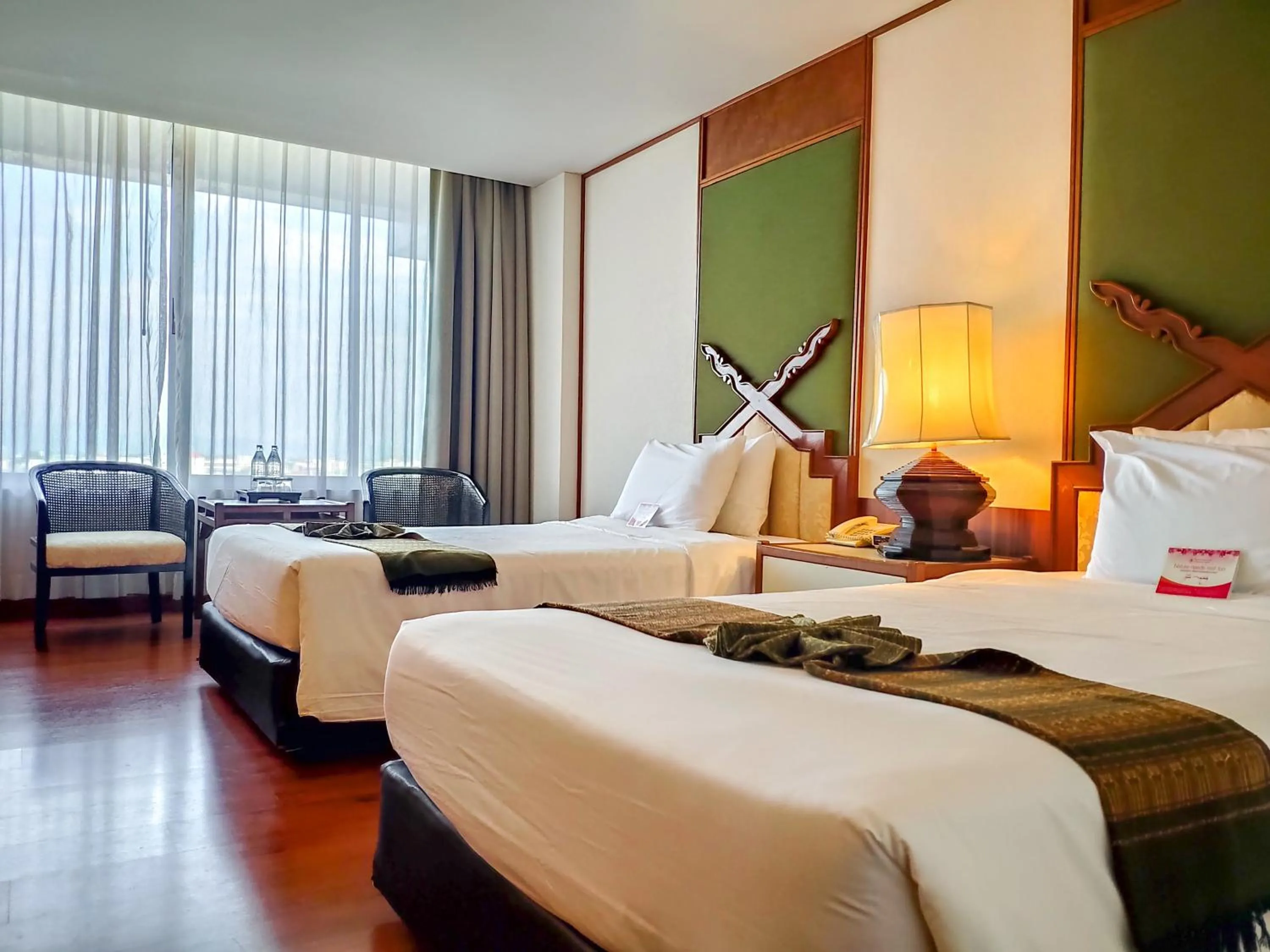 Photo of the whole room, Bed in Chiang Mai Orchid Hotel