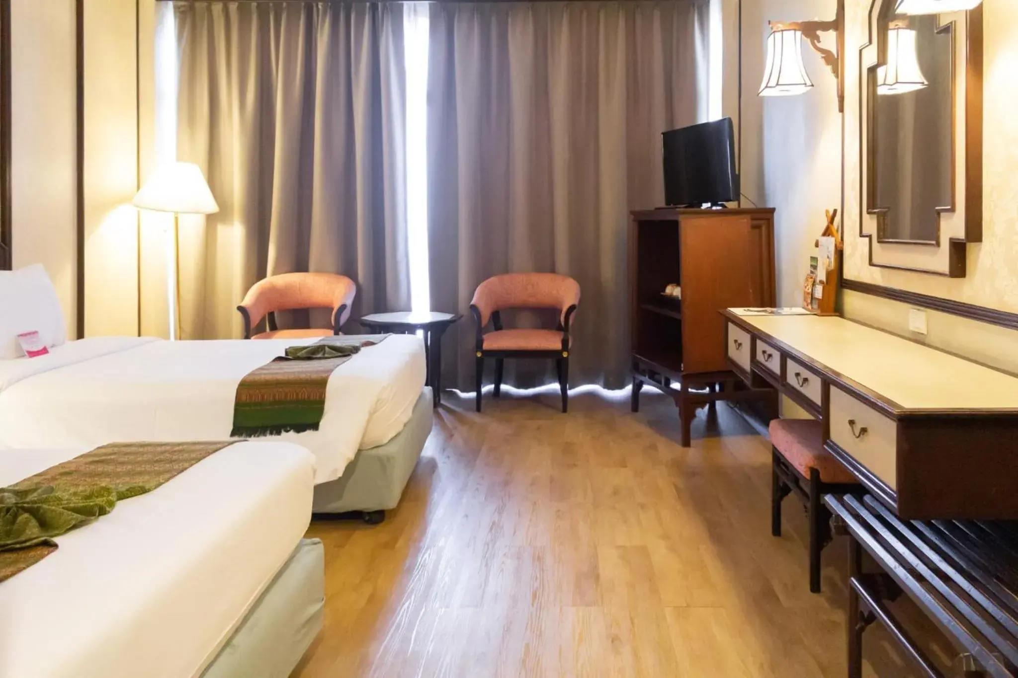 Photo of the whole room, Bed in Chiang Mai Orchid Hotel Photo of the whole room, Bed in Chiang Mai Orchid Hotel