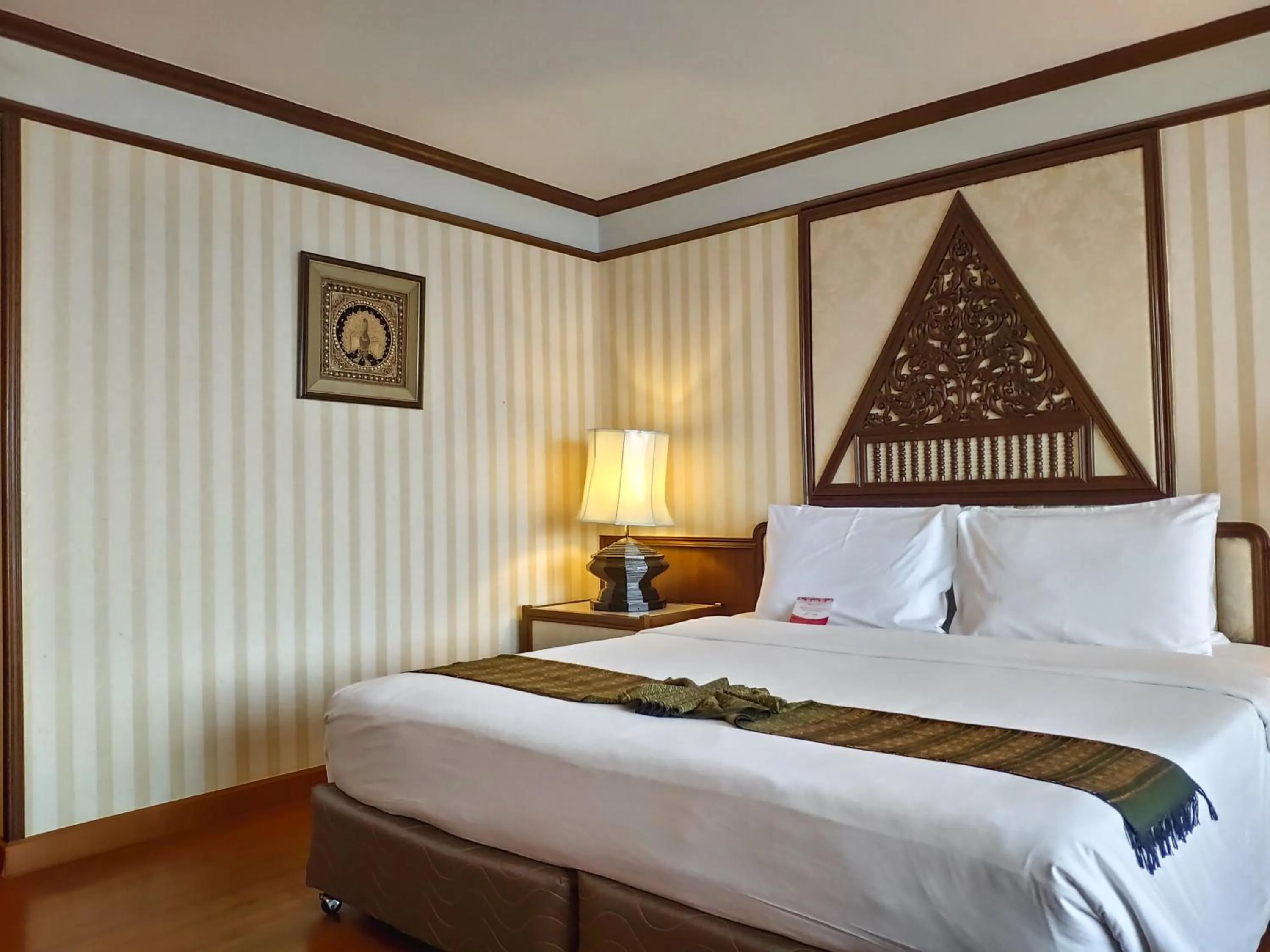 Bed in Chiang Mai Orchid Hotel