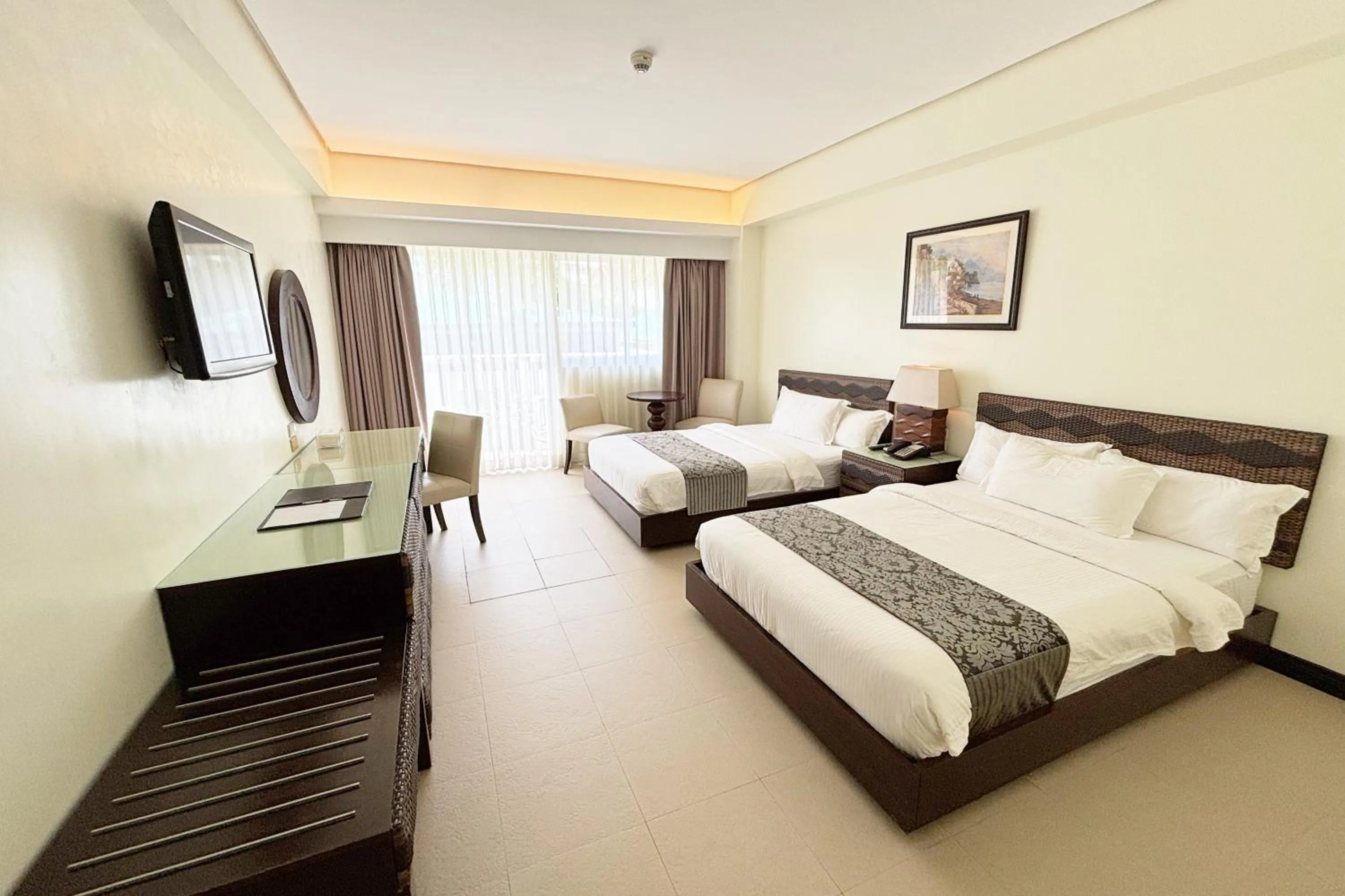 Bed in The Muse Beach Front Hotel Boracay