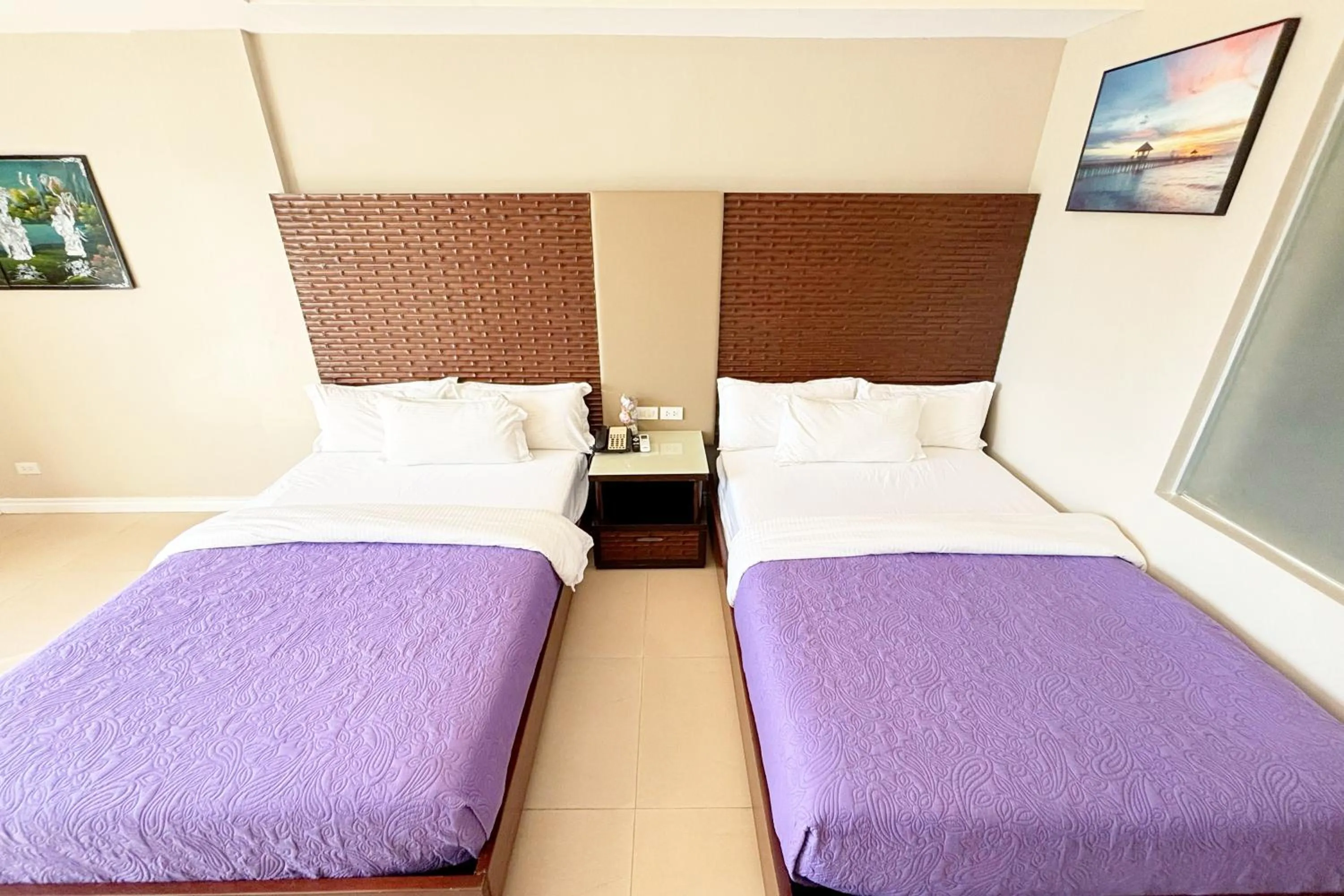 Bed in The Muse Beach Front Hotel Boracay