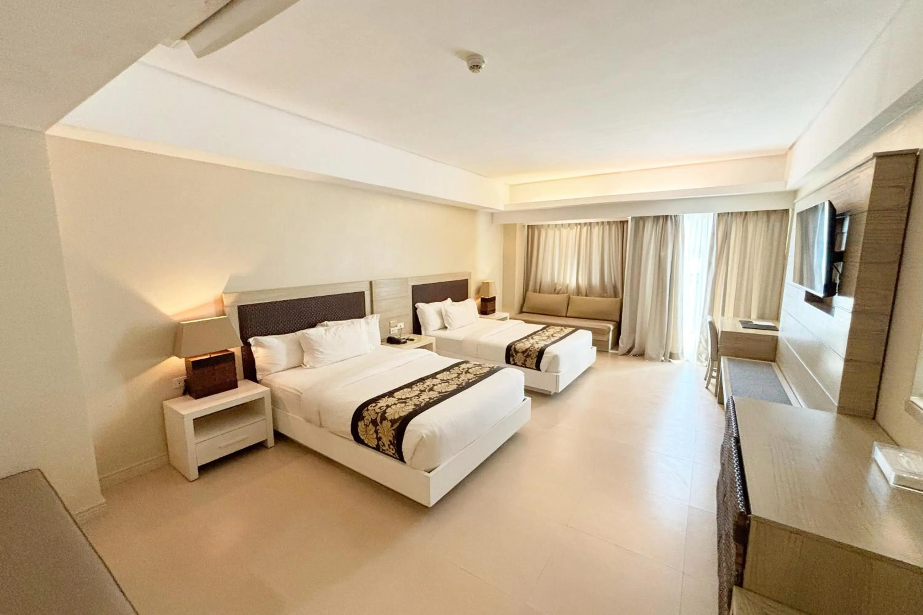 Bed in The Muse Beach Front Hotel Boracay