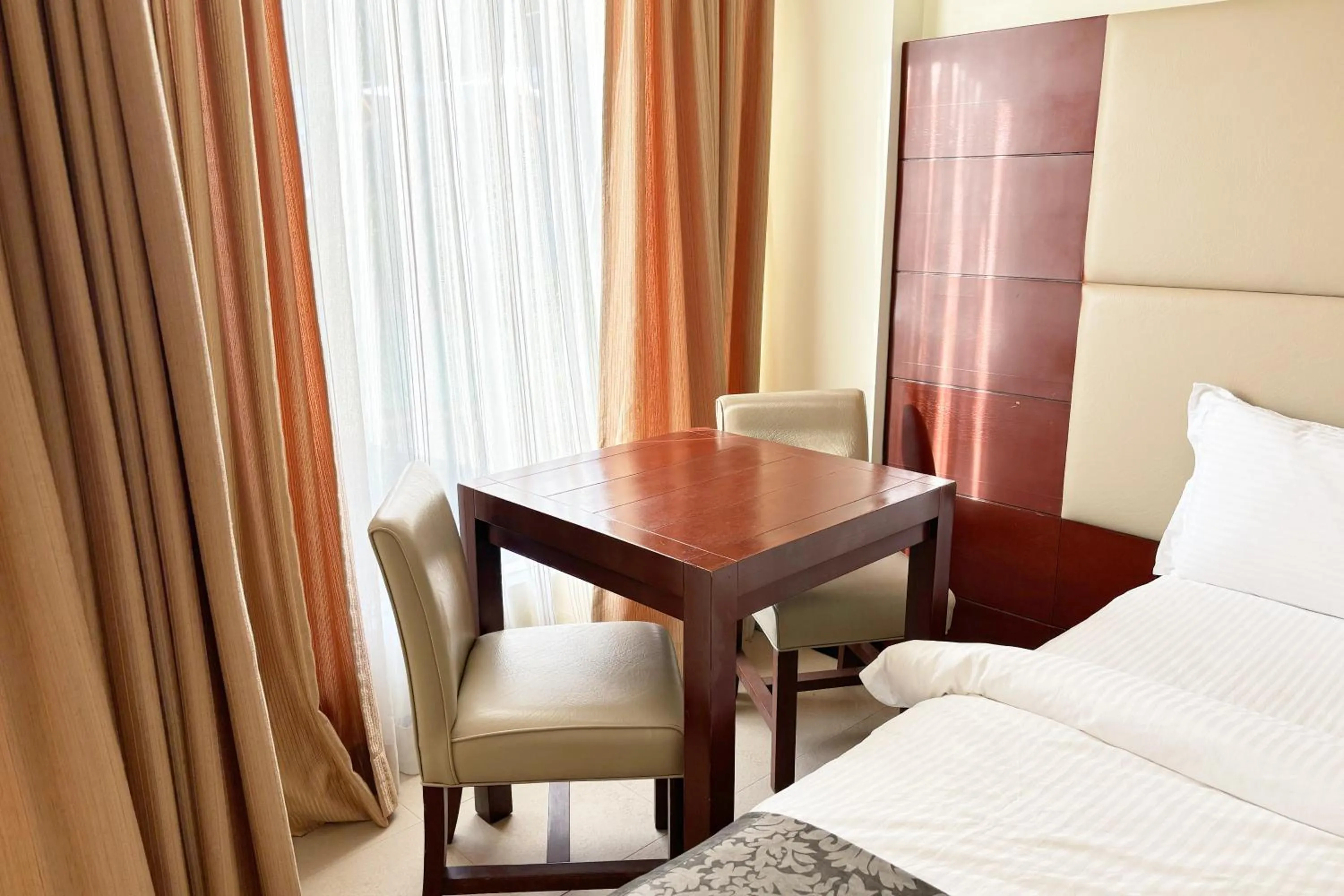 Bed in The Muse Beach Front Hotel Boracay