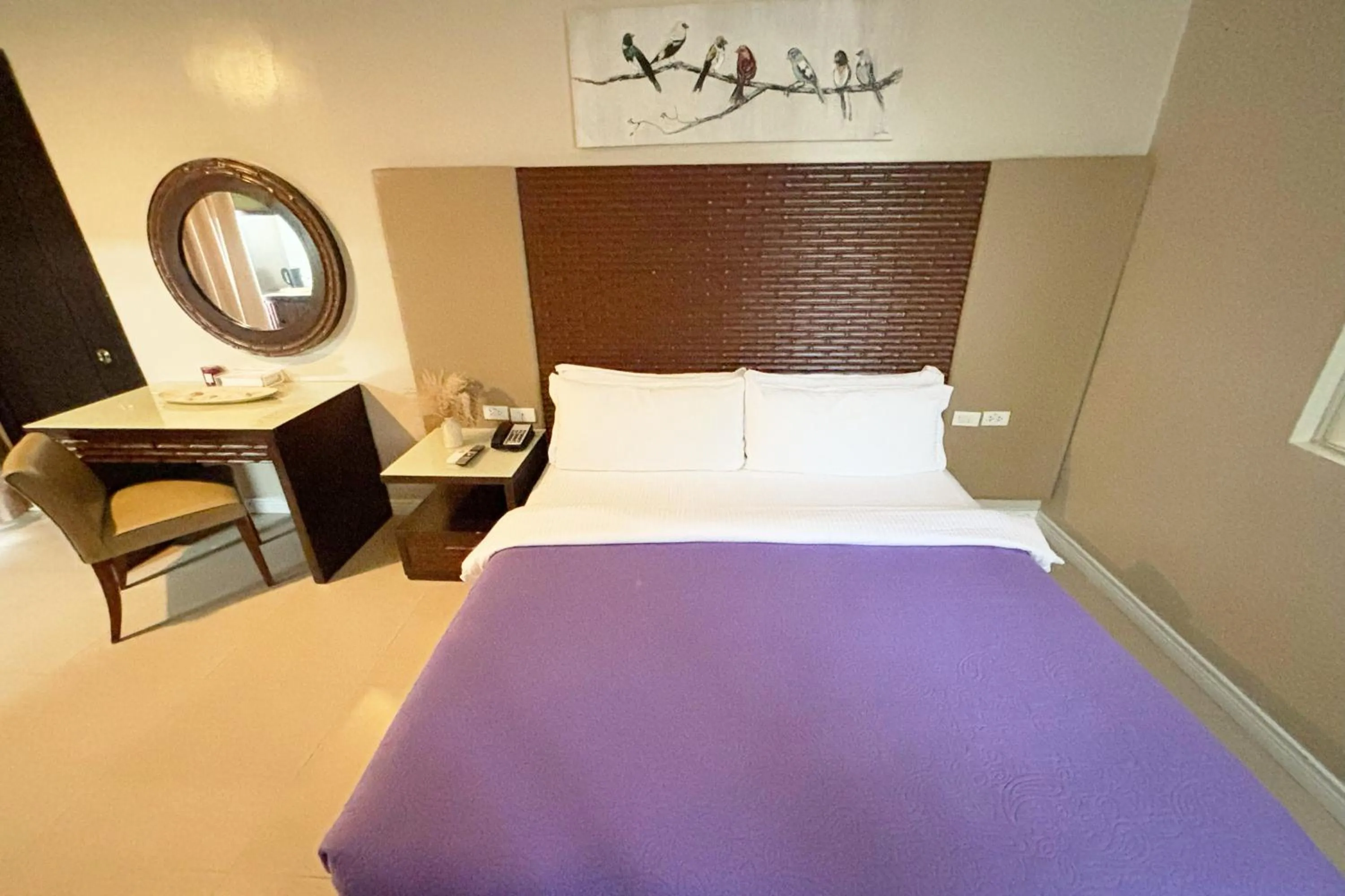 Bed in The Muse Beach Front Hotel Boracay