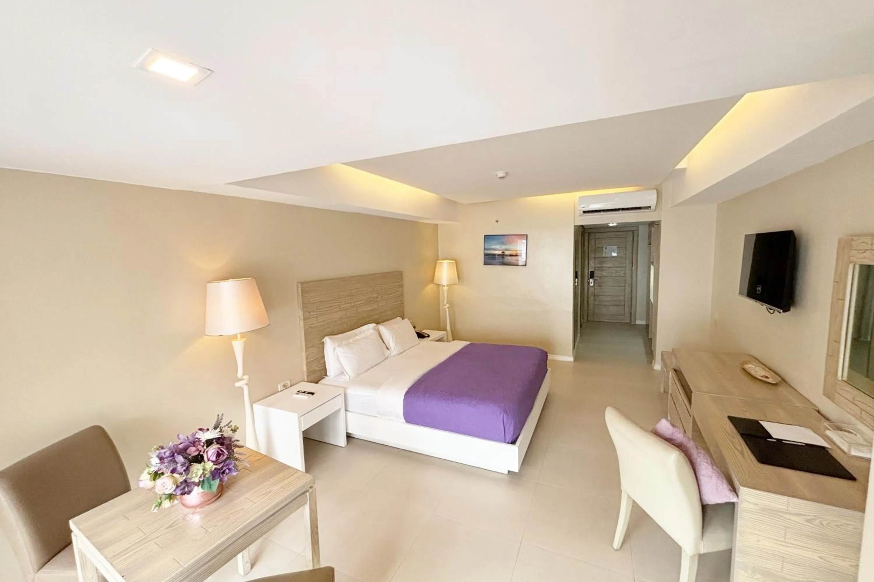 Bed in The Muse Beach Front Hotel Boracay