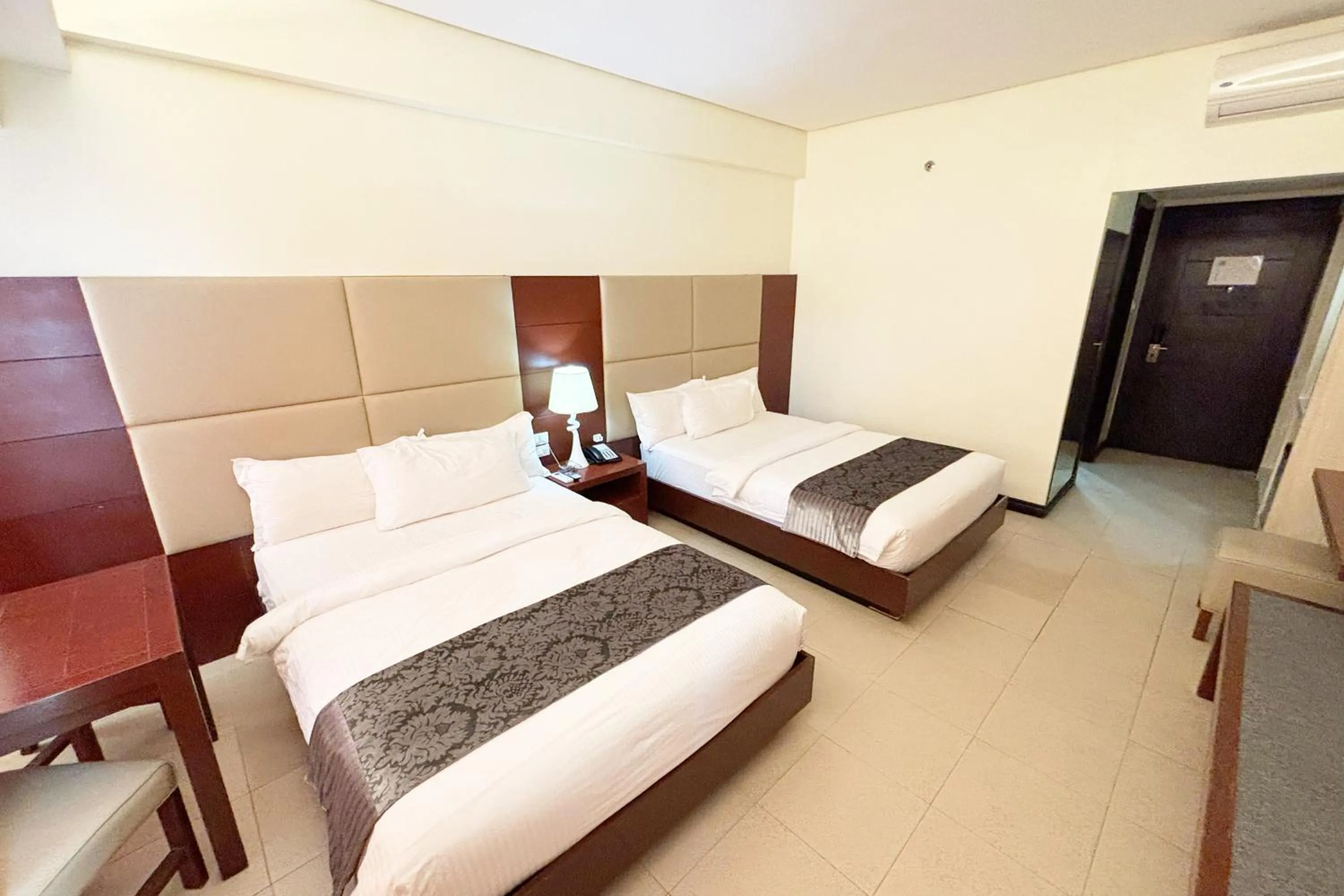 Bed in The Muse Beach Front Hotel Boracay