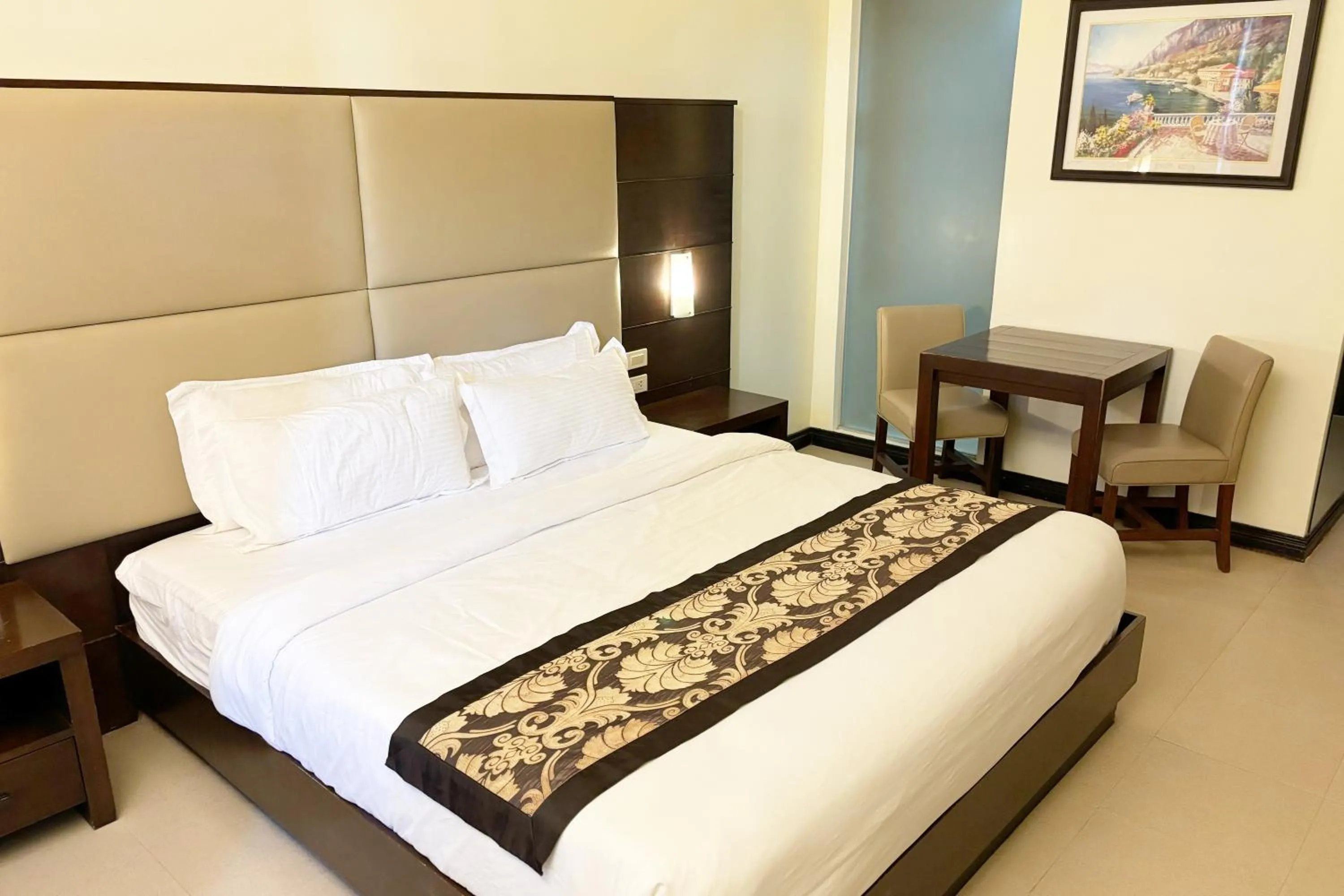 Bed in The Muse Beach Front Hotel Boracay