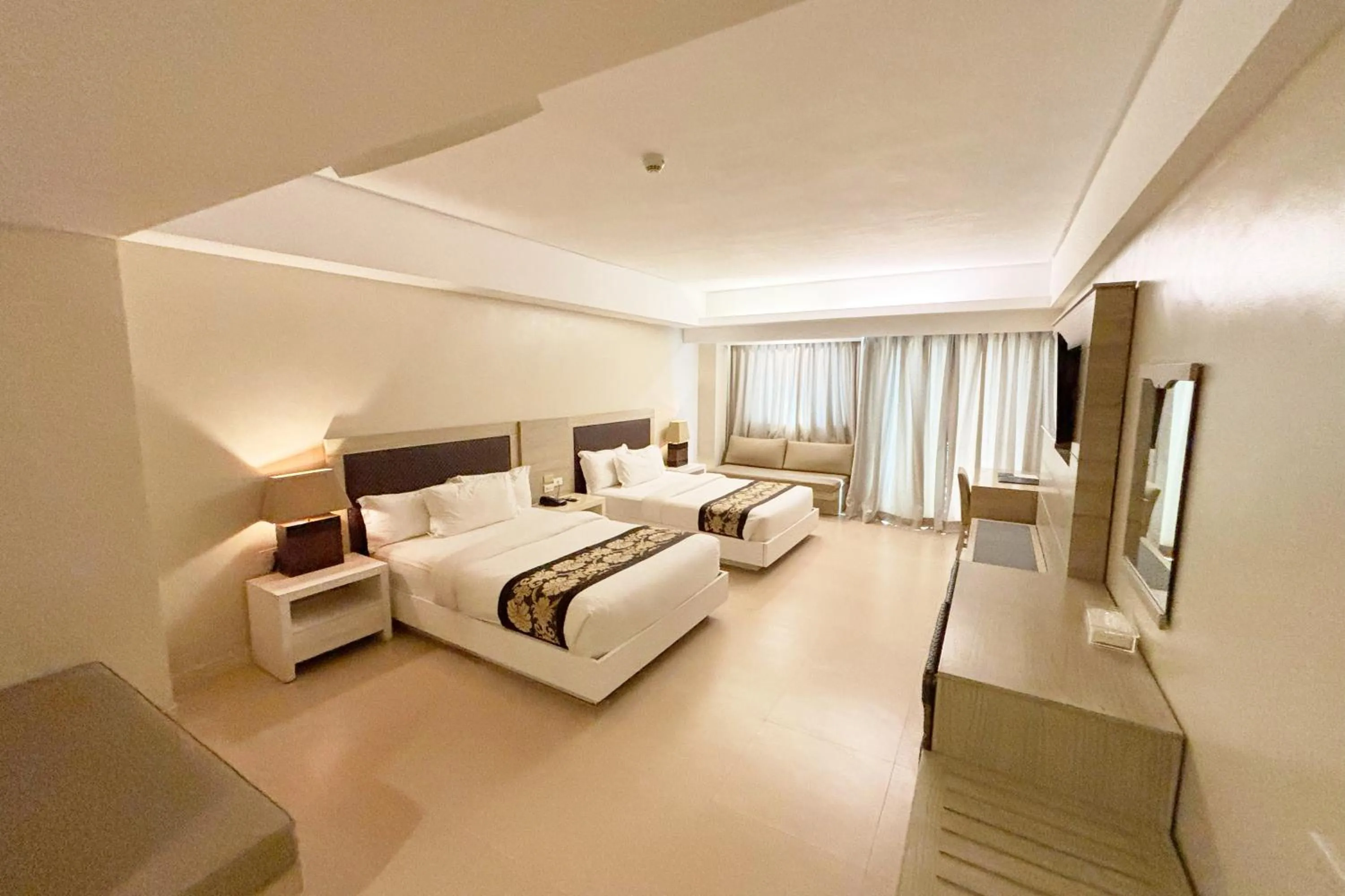 Bed in The Muse Beach Front Hotel Boracay