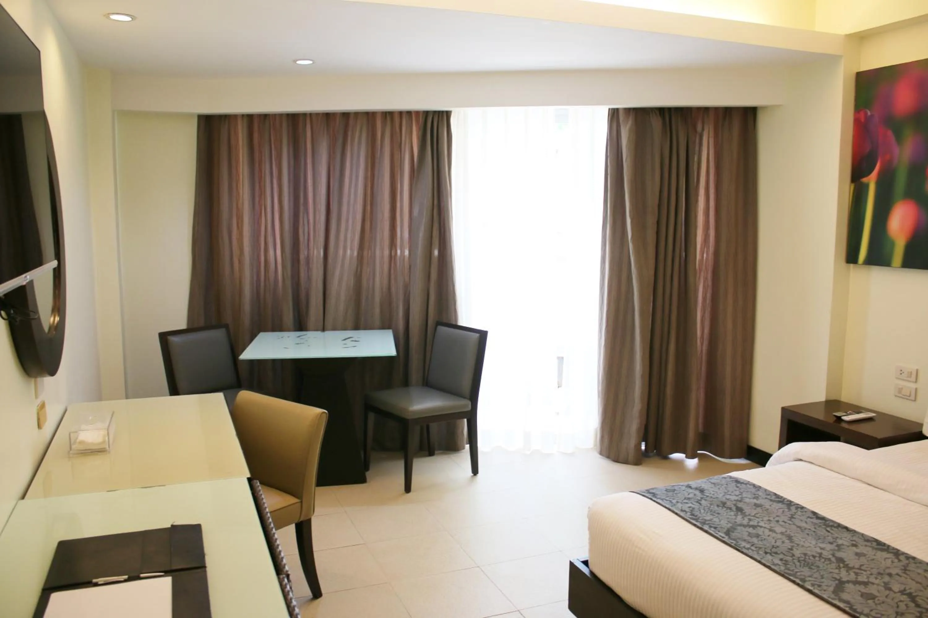 Bed in The Muse Beach Front Hotel Boracay