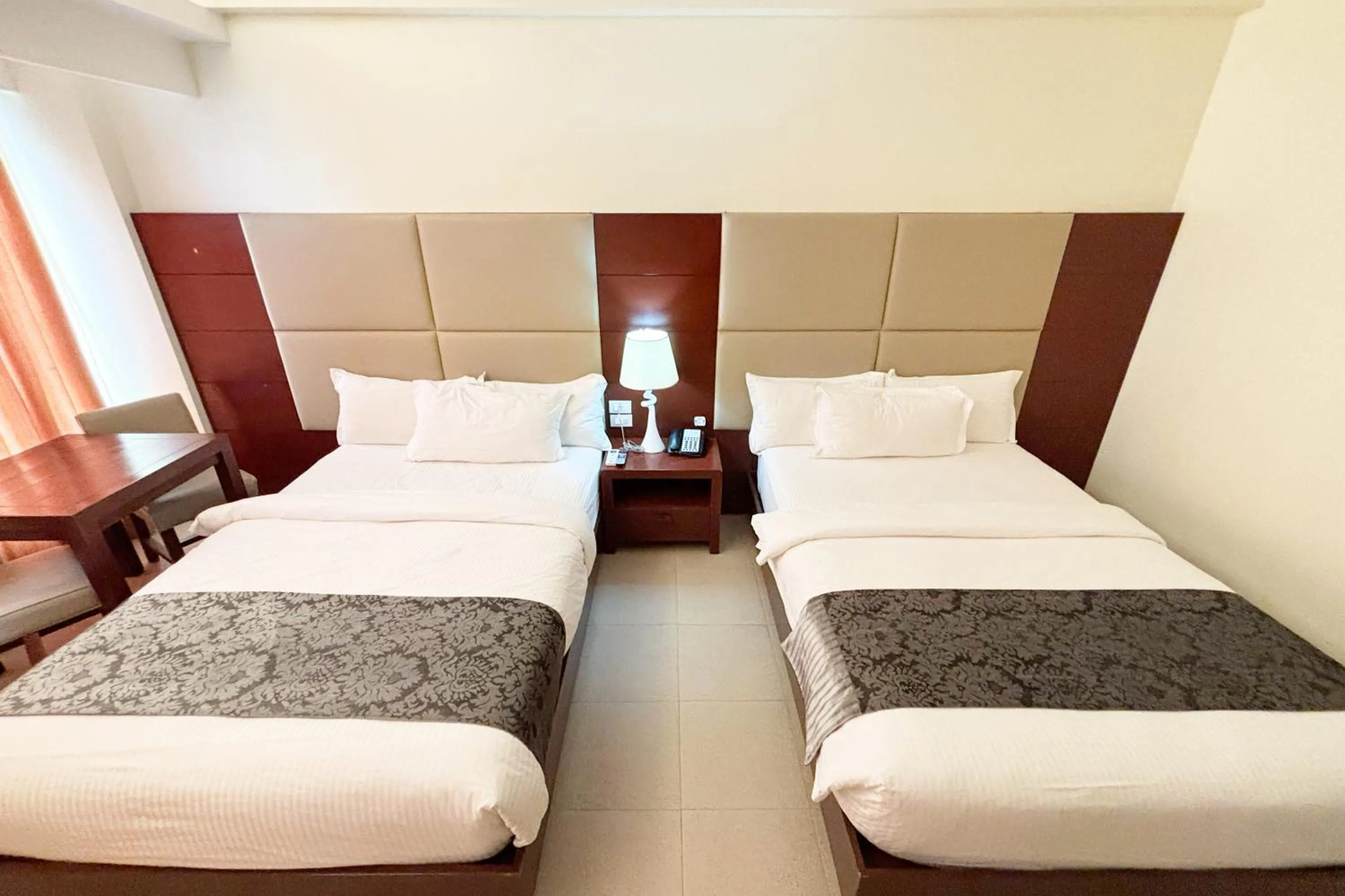 Bed in The Muse Beach Front Hotel Boracay