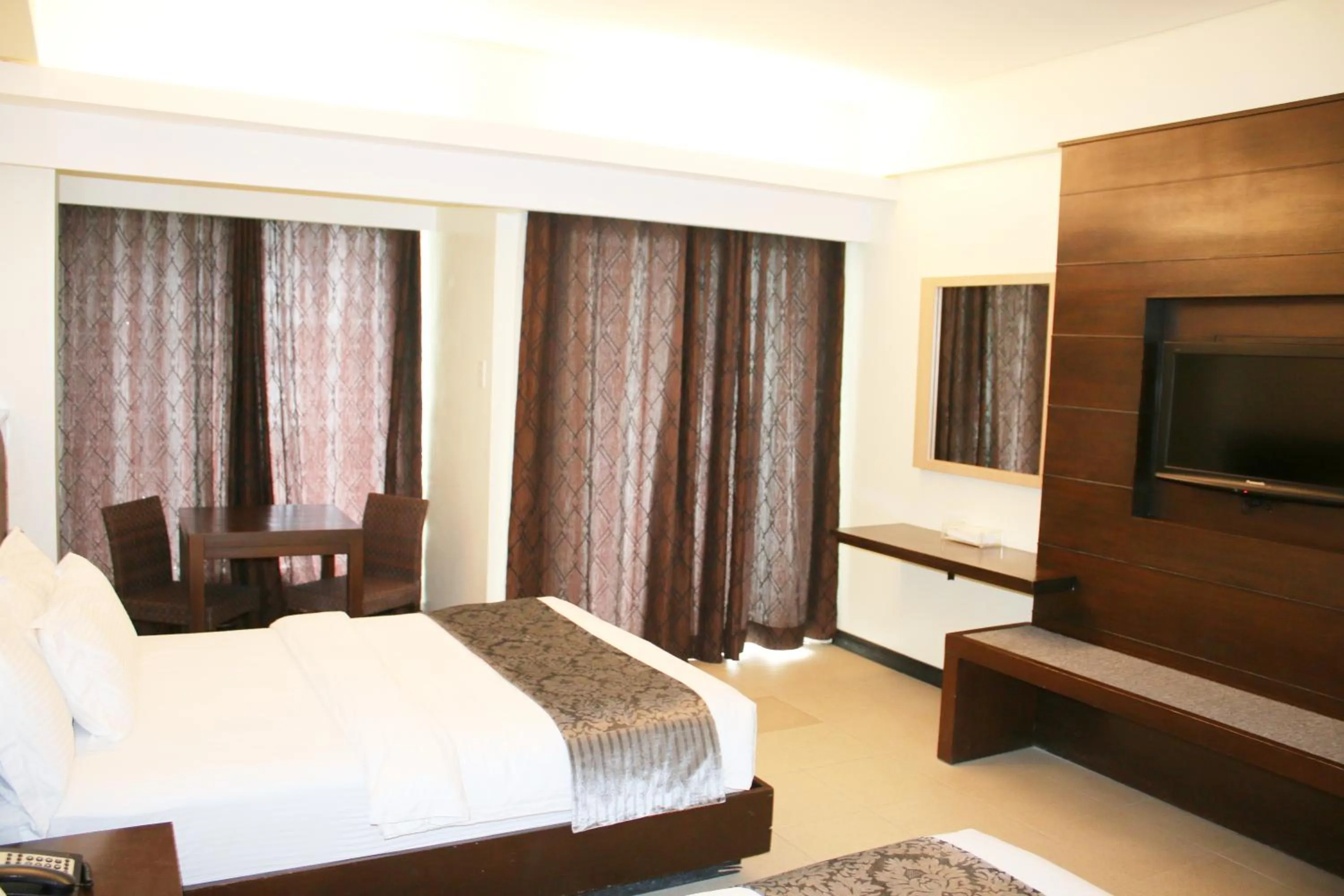 Bed in The Muse Beach Front Hotel Boracay