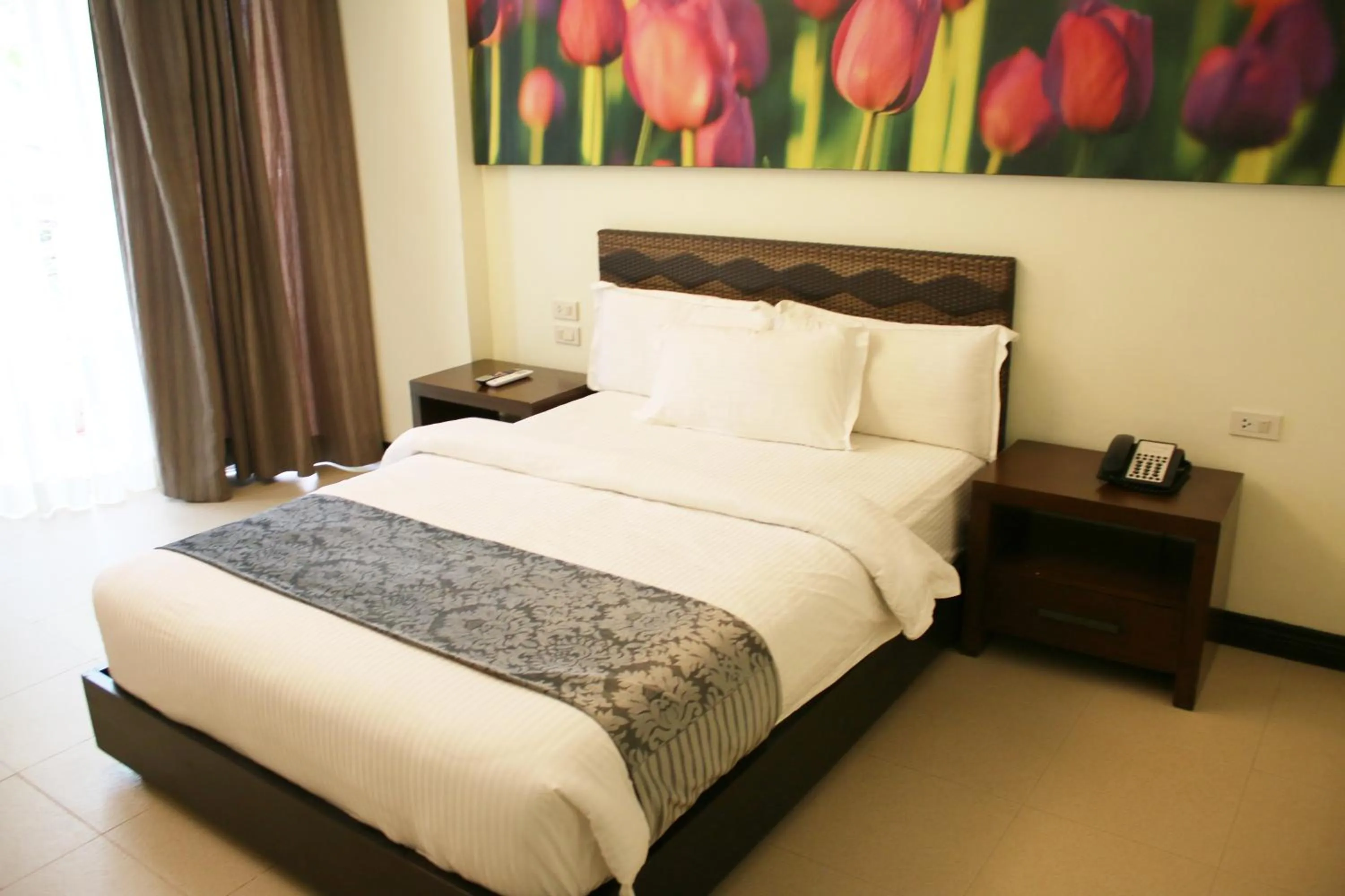 Bed in The Muse Beach Front Hotel Boracay