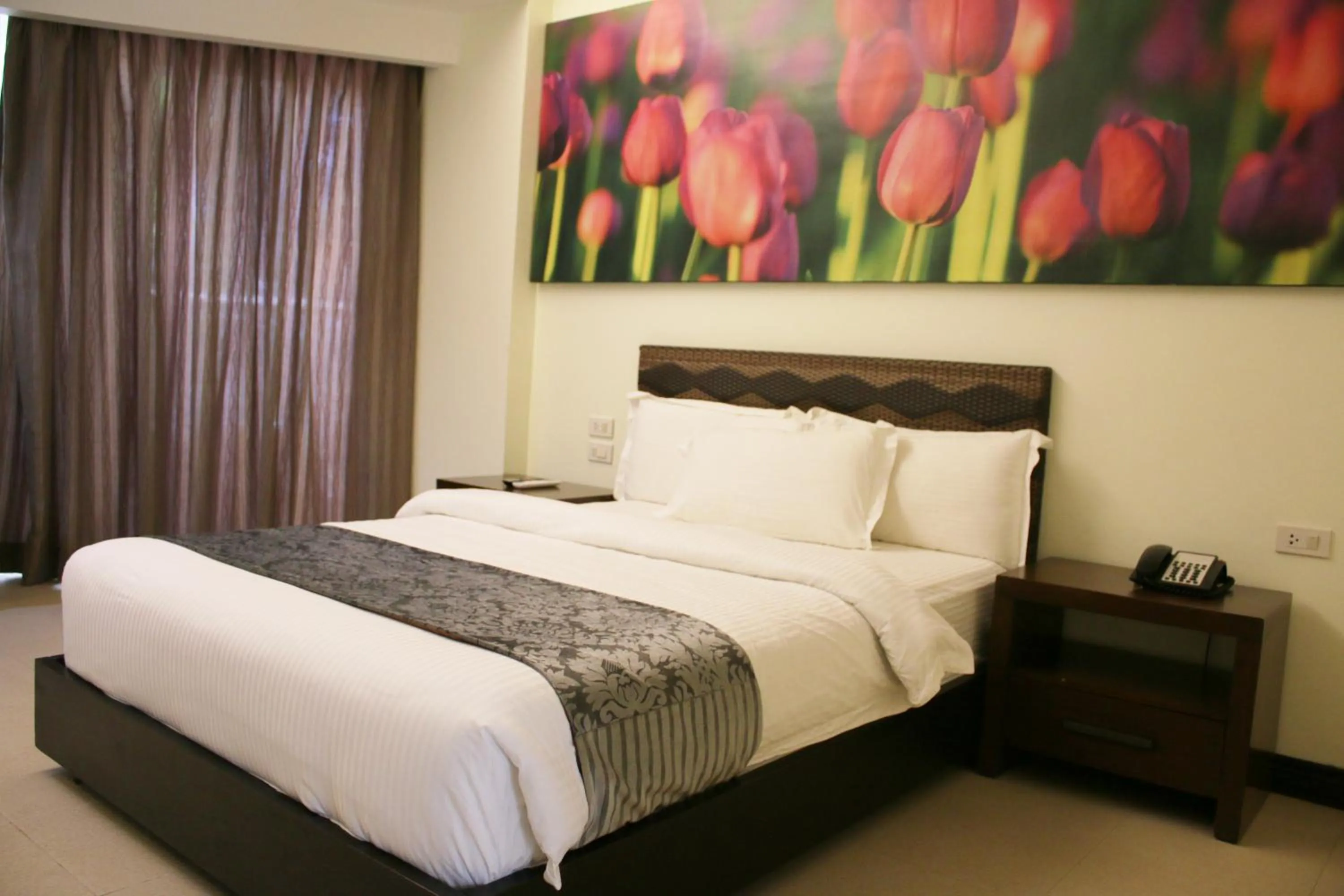 Bed in The Muse Beach Front Hotel Boracay