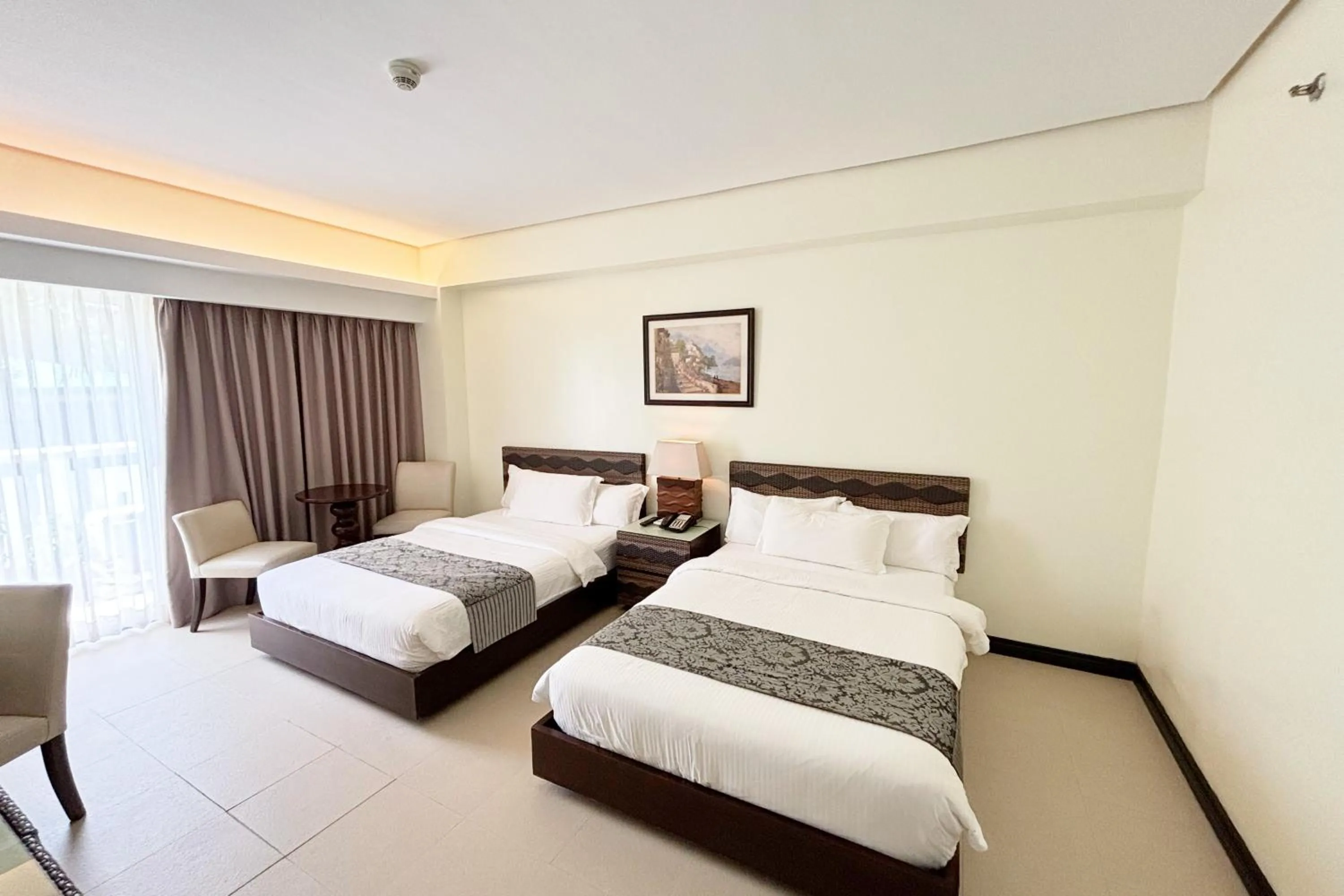 Bed in The Muse Beach Front Hotel Boracay