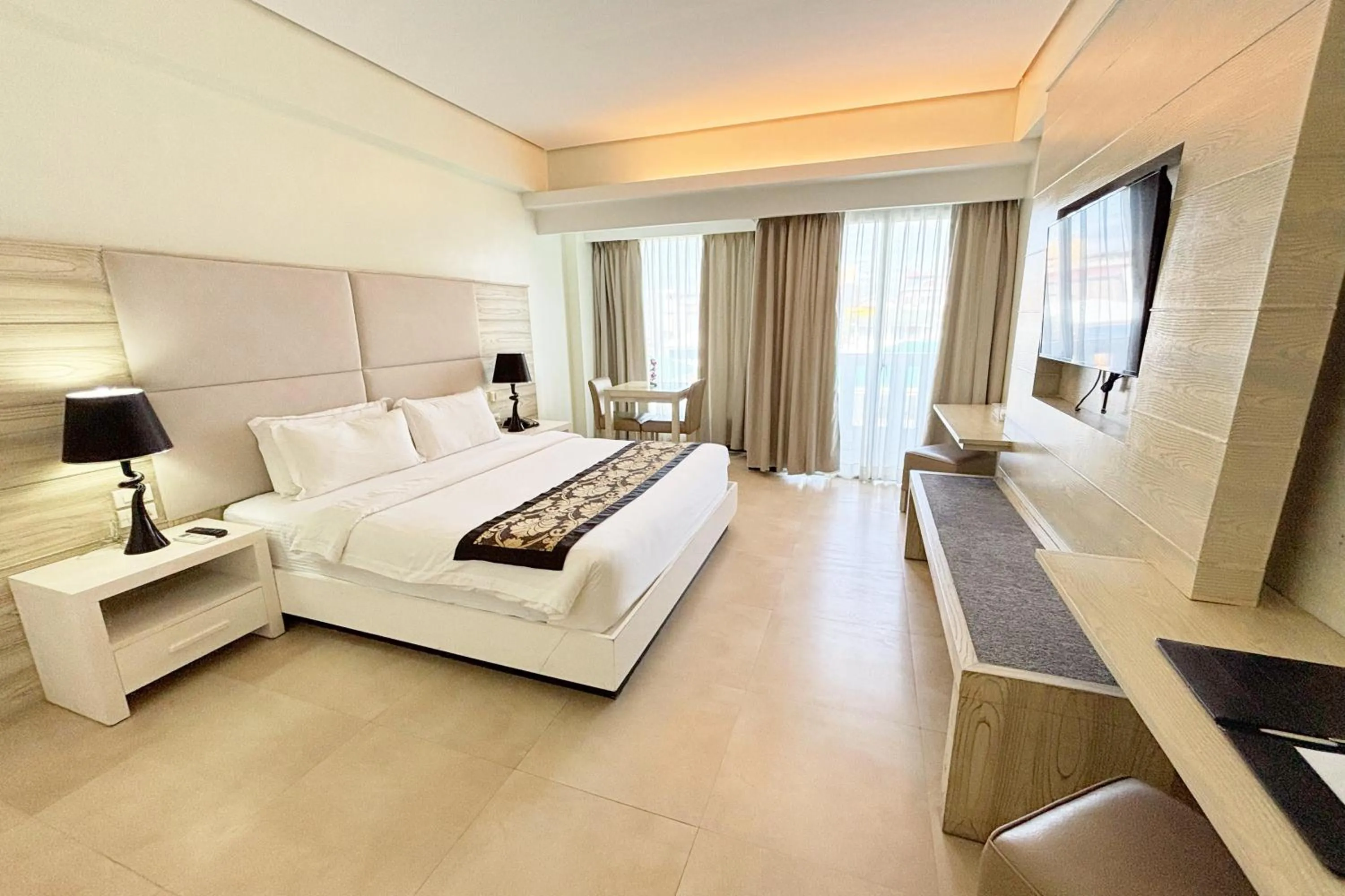 Bed in The Muse Beach Front Hotel Boracay