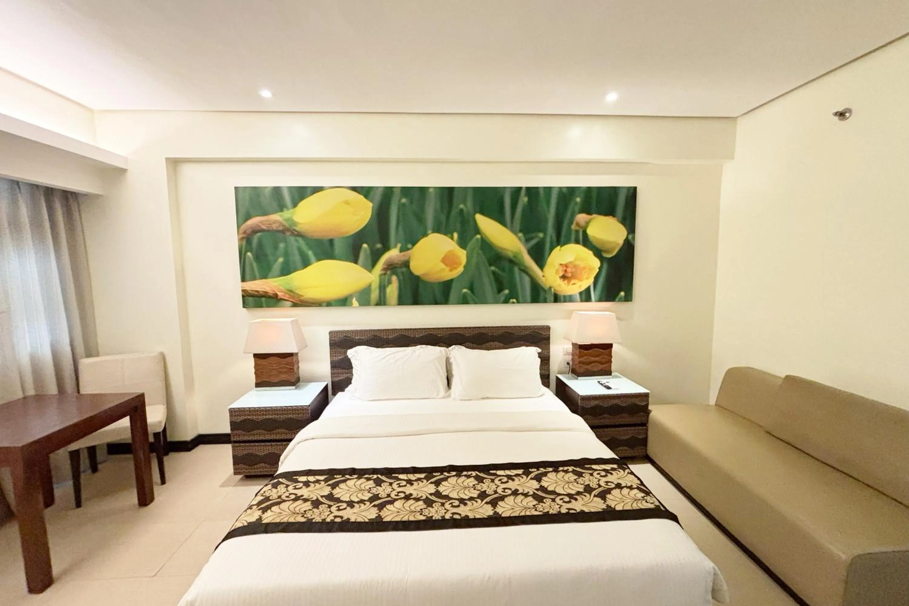 Bed in The Muse Beach Front Hotel Boracay