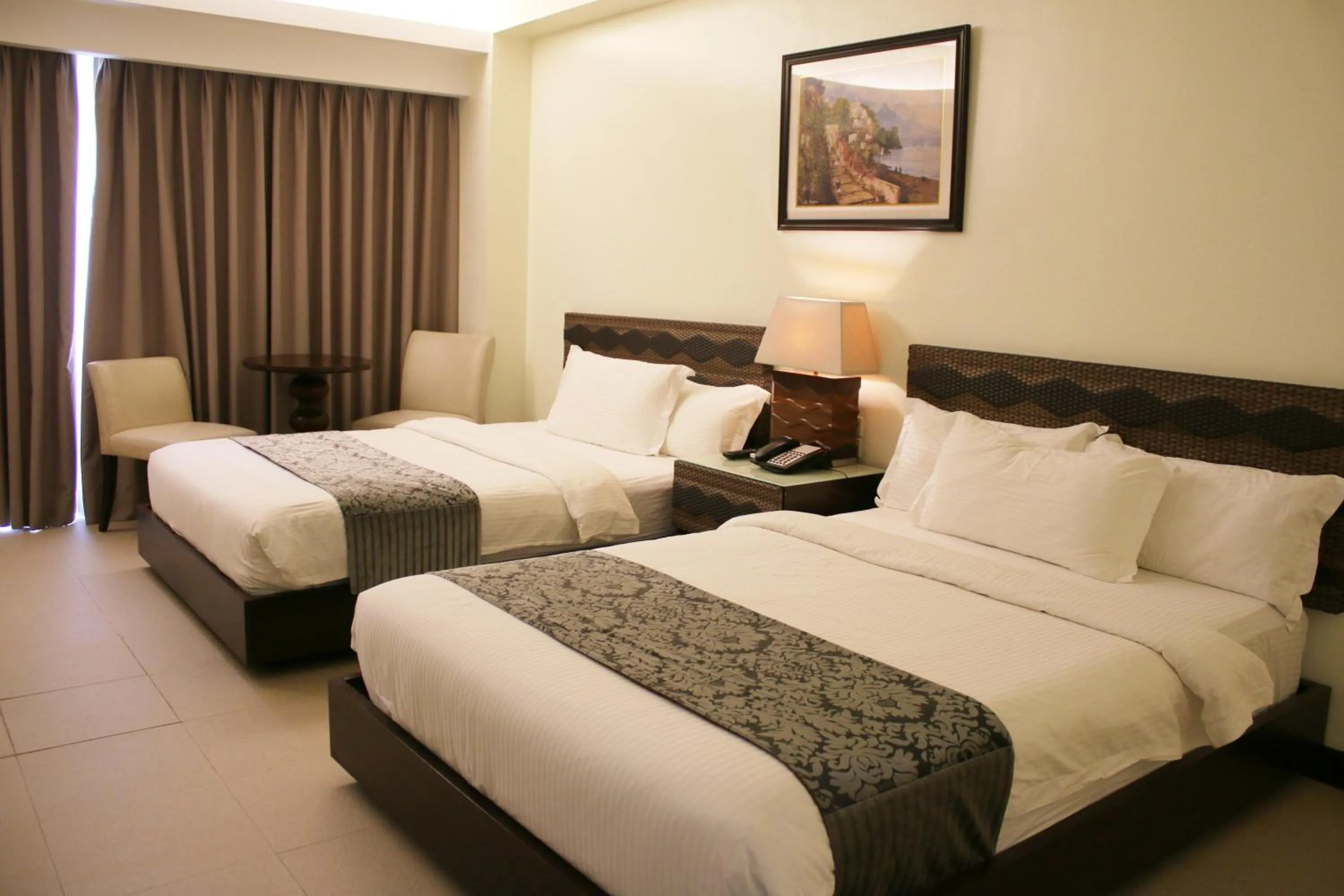 Bed in The Muse Beach Front Hotel Boracay