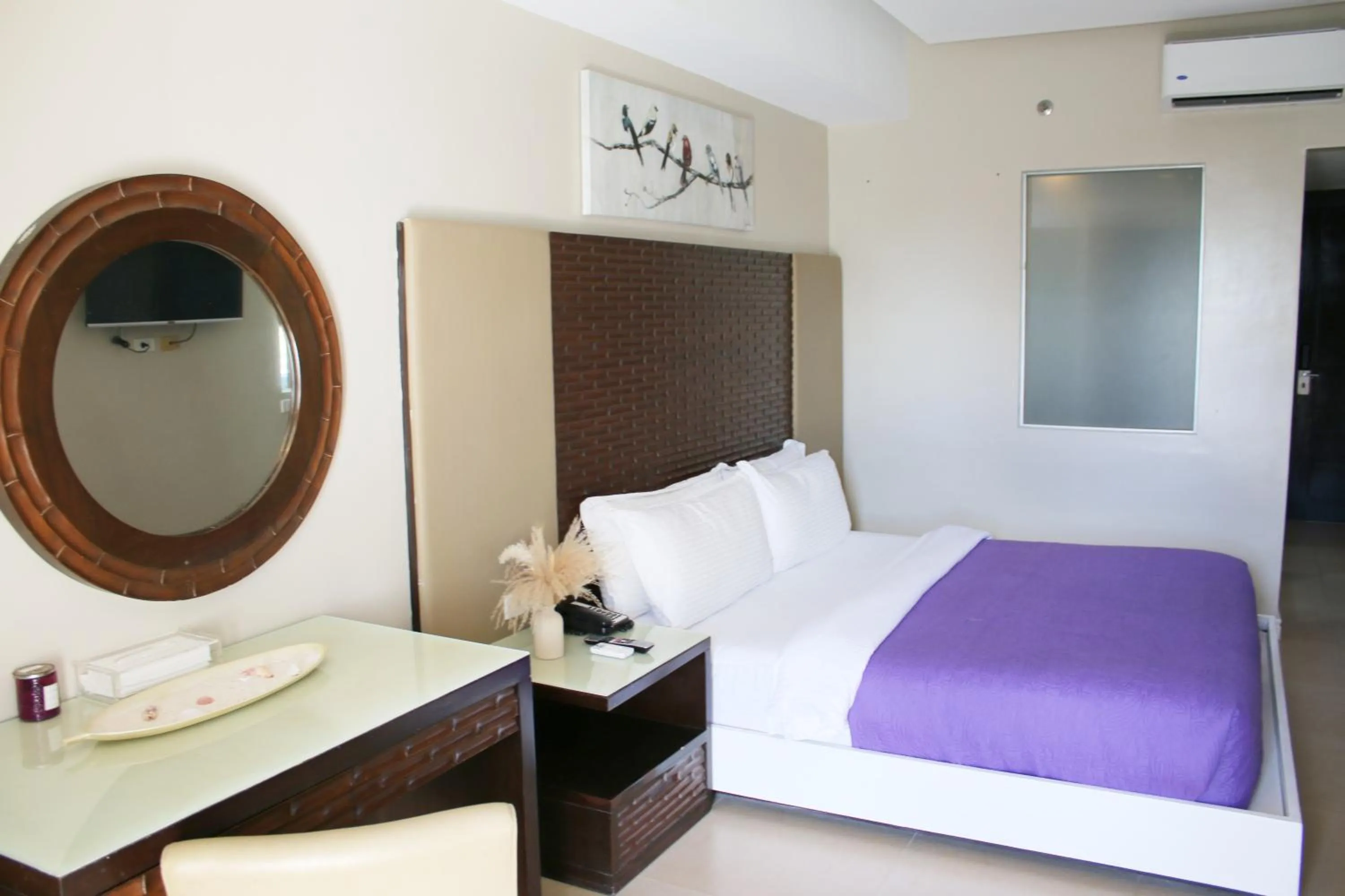 Bed in The Muse Beach Front Hotel Boracay