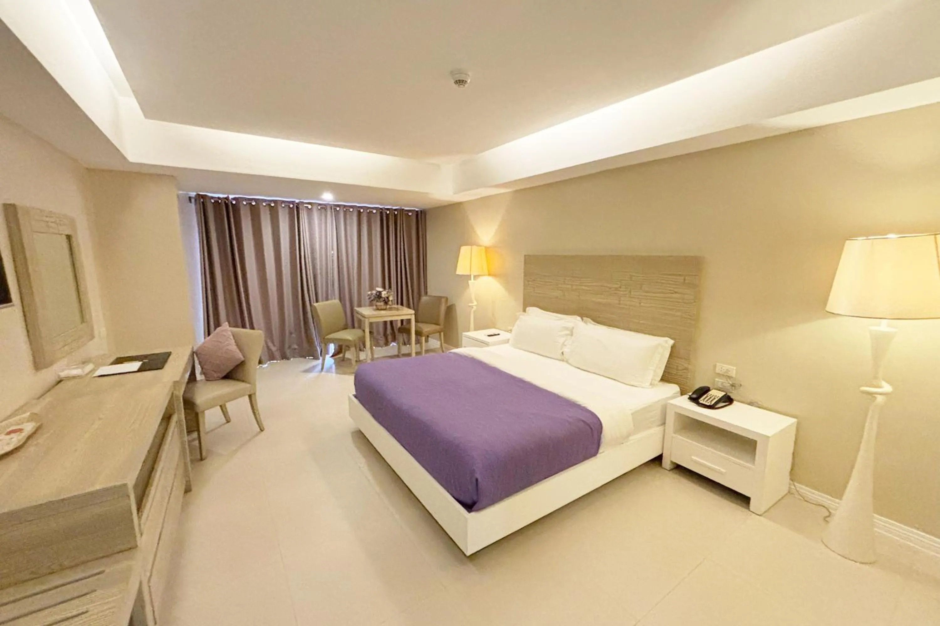 Bed in The Muse Beach Front Hotel Boracay