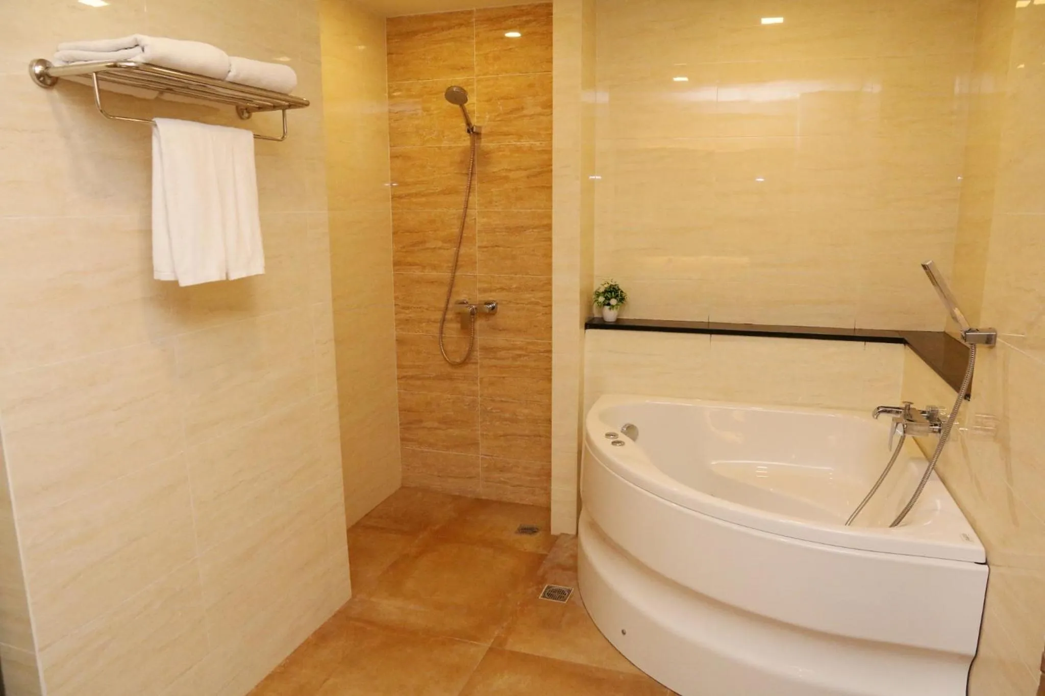 Shower in Crystal Palace Luxury Hotel Pattaya