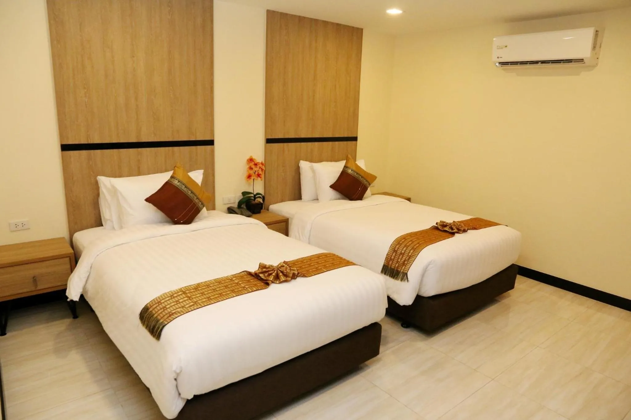 Bed in Crystal Palace Luxury Hotel Pattaya