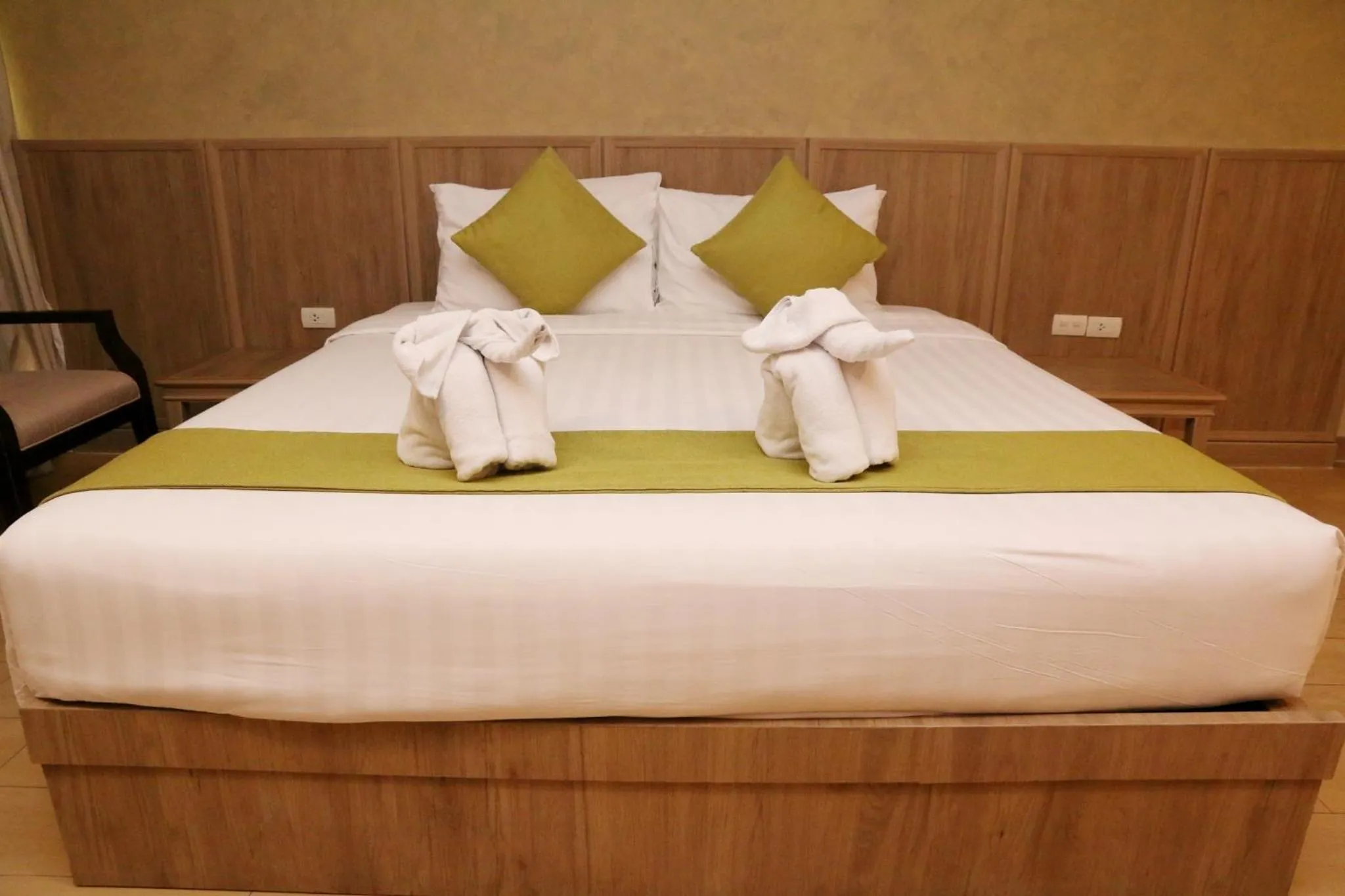 Bed in Crystal Palace Luxury Hotel Pattaya