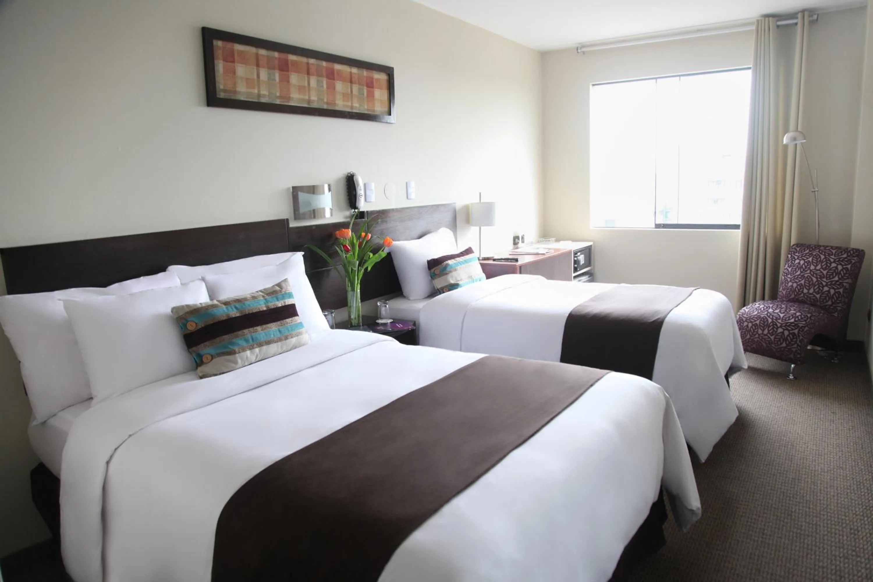 Bed in Hotel Rivera Inn