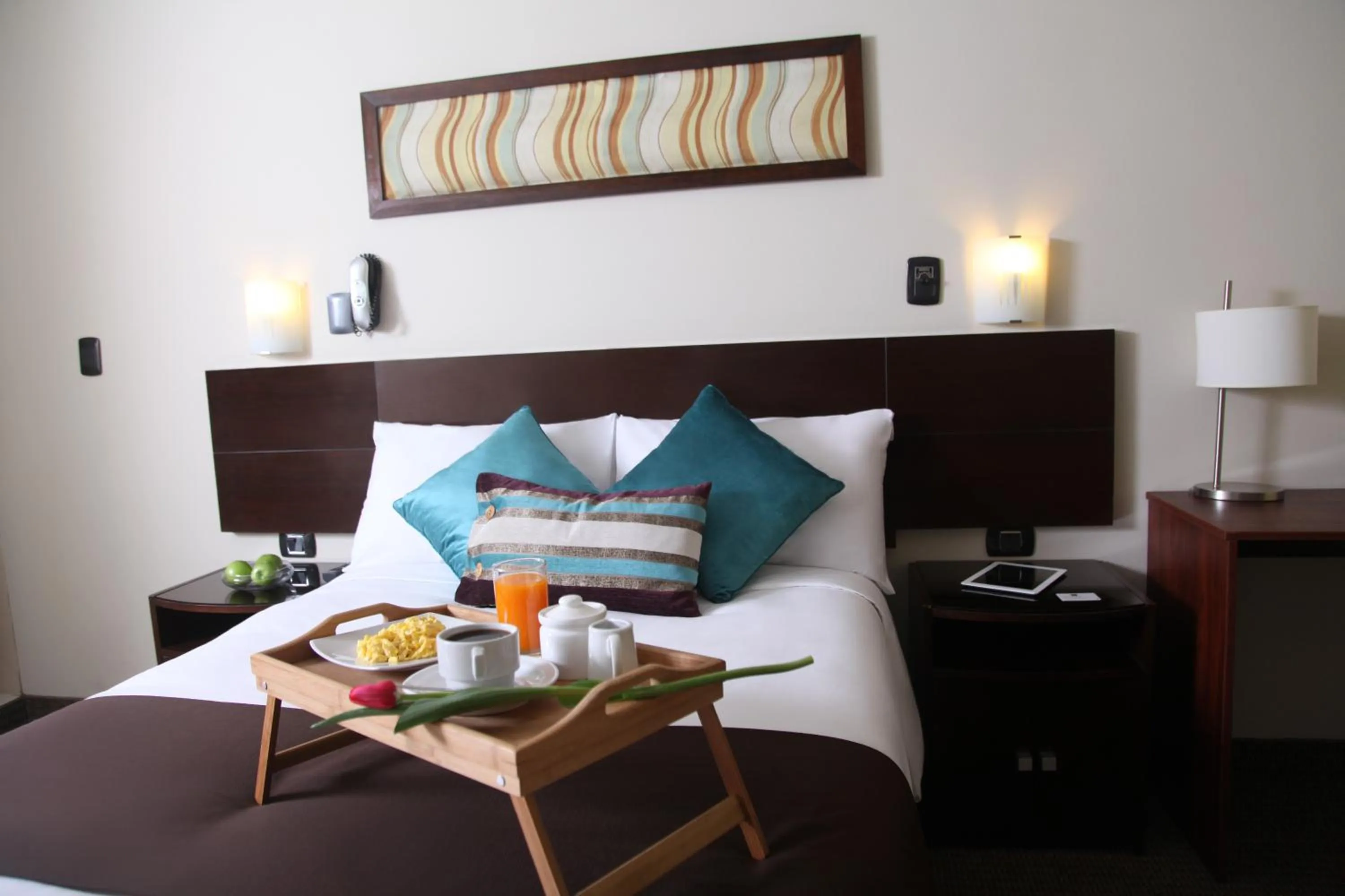 Bed in Hotel Rivera Inn