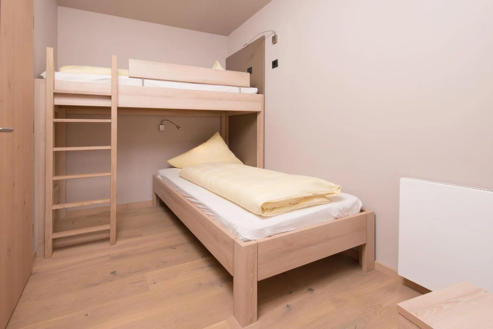 Bed in Familotel Alphotel